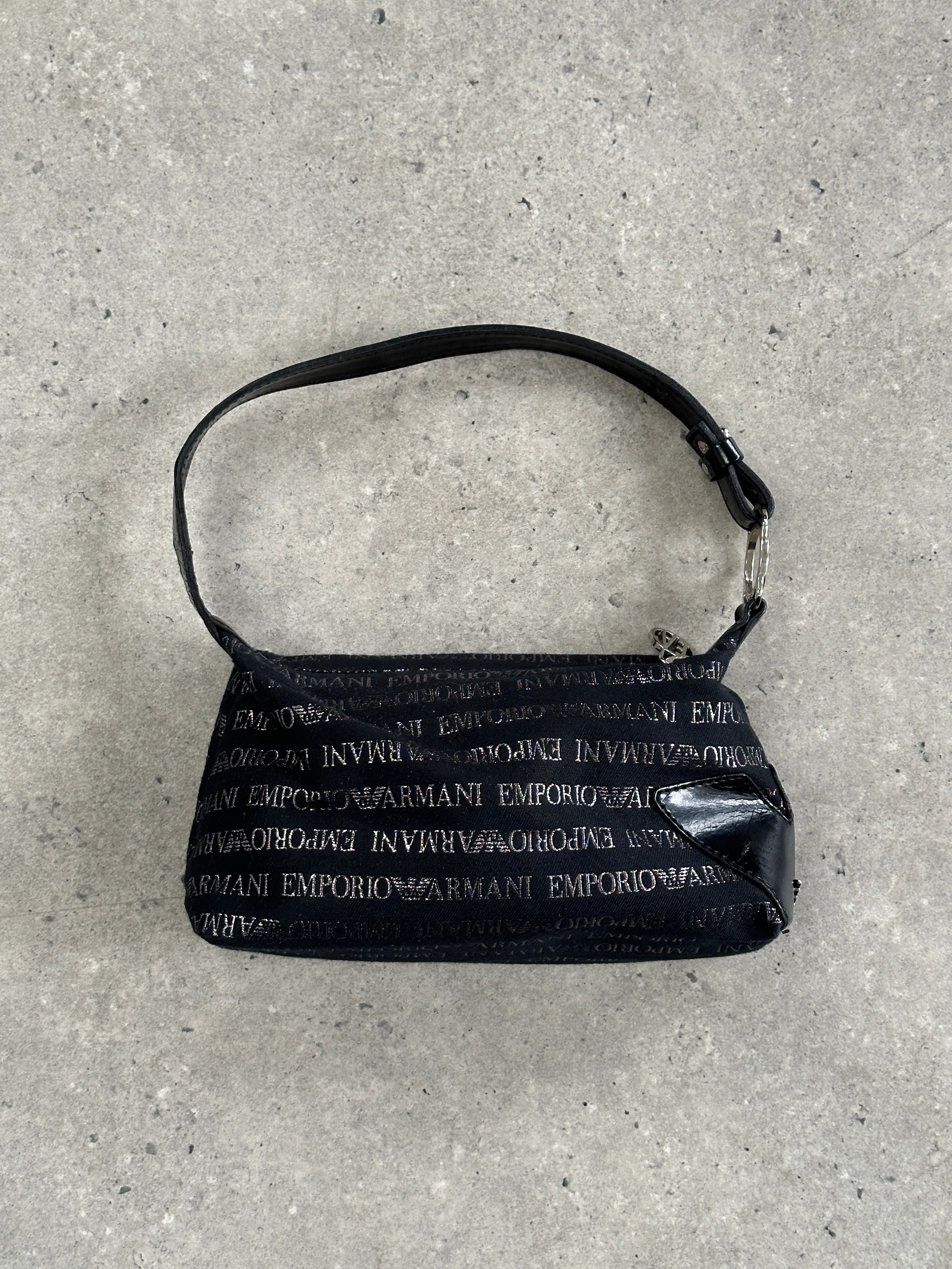 Emporio Armani Monogram Shoulder Bag featuring stylish design, leather material, and signature Armani logo detail.