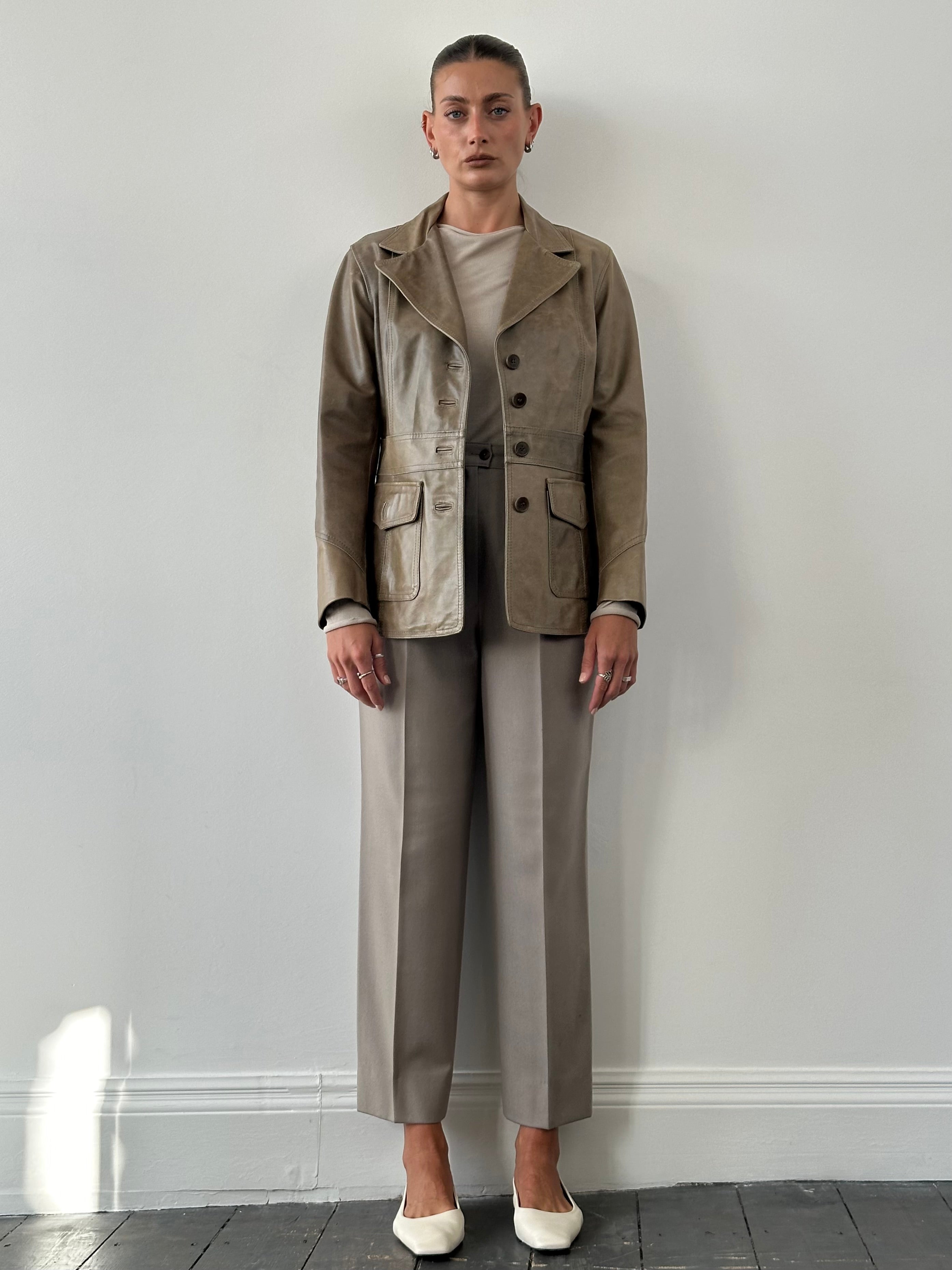 Vintage Italian high-waisted pure wool trousers in W26, showcasing classic vintage style with tailored fit and elegant design.