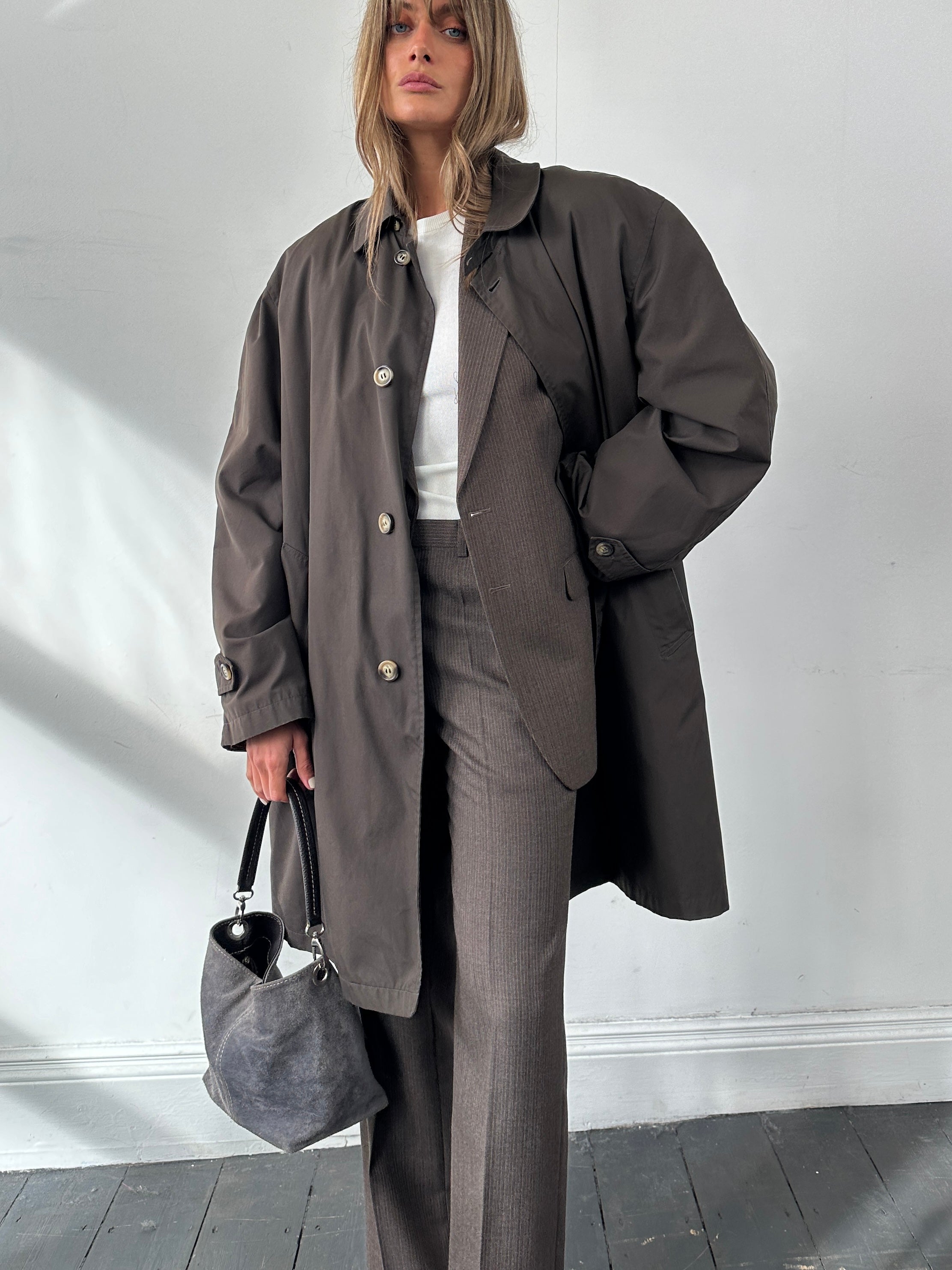 St Michael pinstripe worsted wool single-breasted jumpsuit in size 38R/W30, featuring a tailored fit and classic pinstripe pattern.