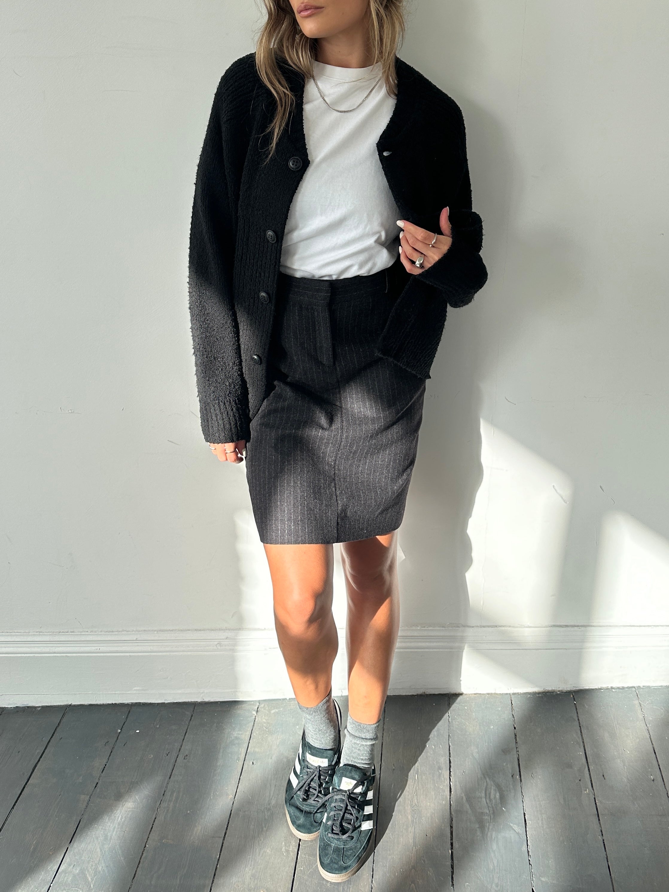 Burberry London wool pinstripe skirt in size W28, featuring classic pinstripe pattern and tailored fit.