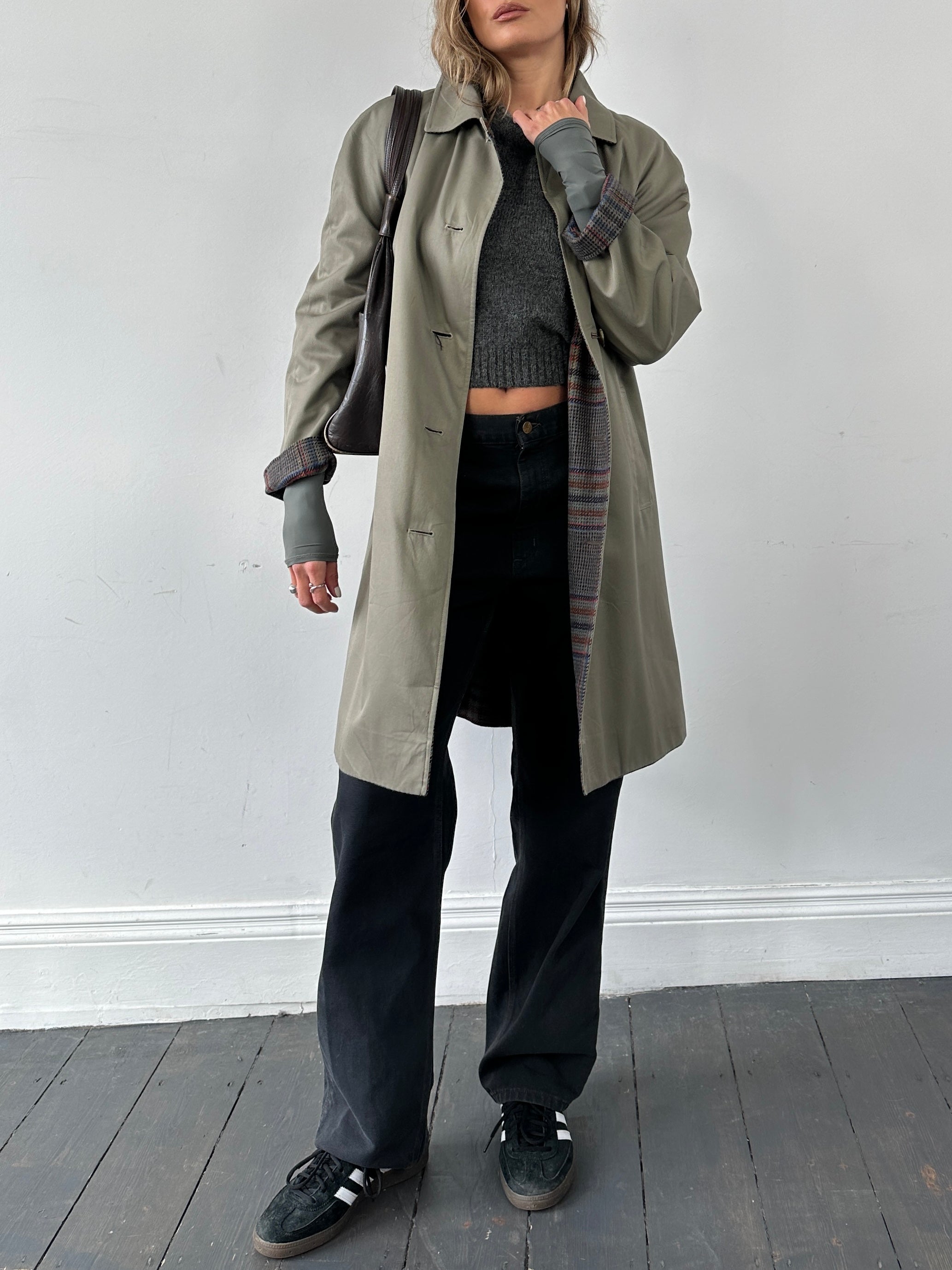 Vintage British vintage reversible wool trench coat, size S, showcasing classic design and warm, textured fabric.