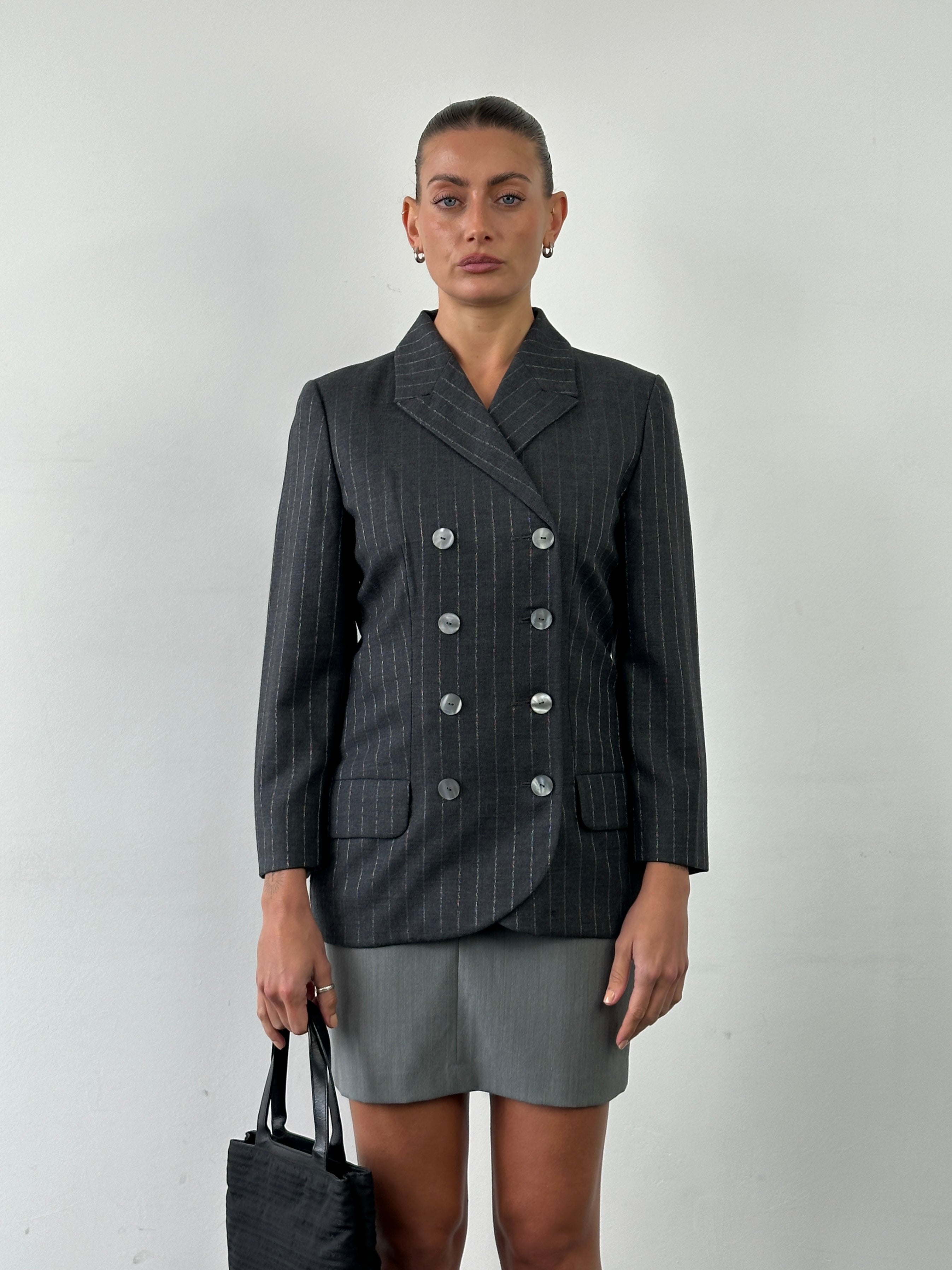 Vintage Italian vintage double layered front split mini skirt with W24 size, showcasing a stylish, layered design and split detail.