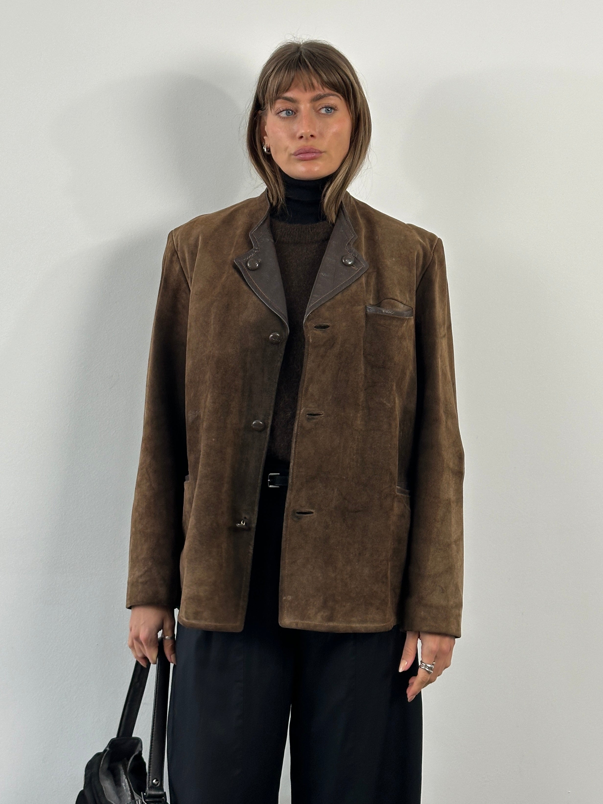 Vintage 1970s XL suede leather jacket, showcasing classic design with soft, textured suede and a tailored fit.