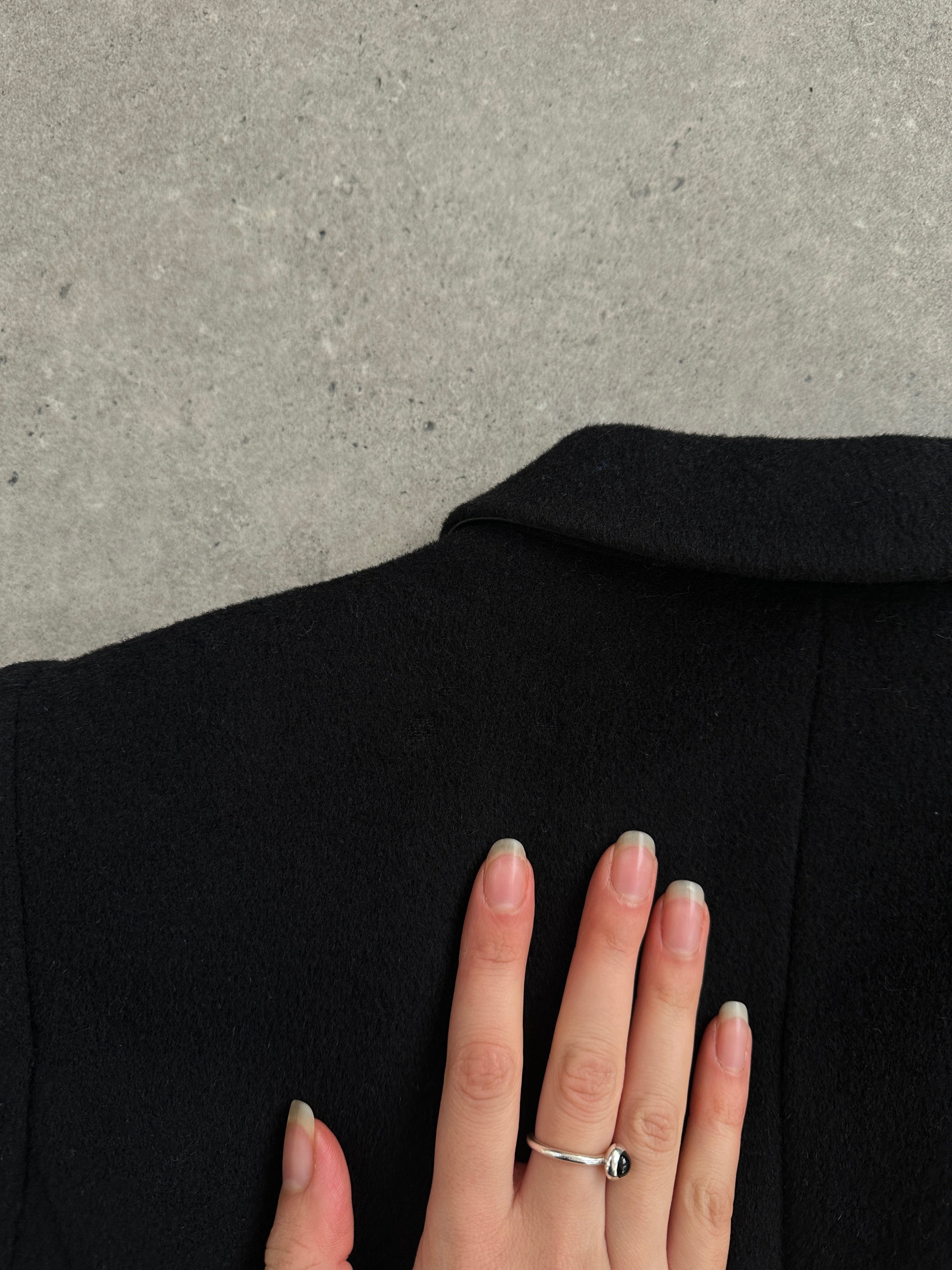 L.K. Bennett pure wool minimal wrap coat in medium size, featuring a sleek, tailored design with a front wrap and classic collar.
