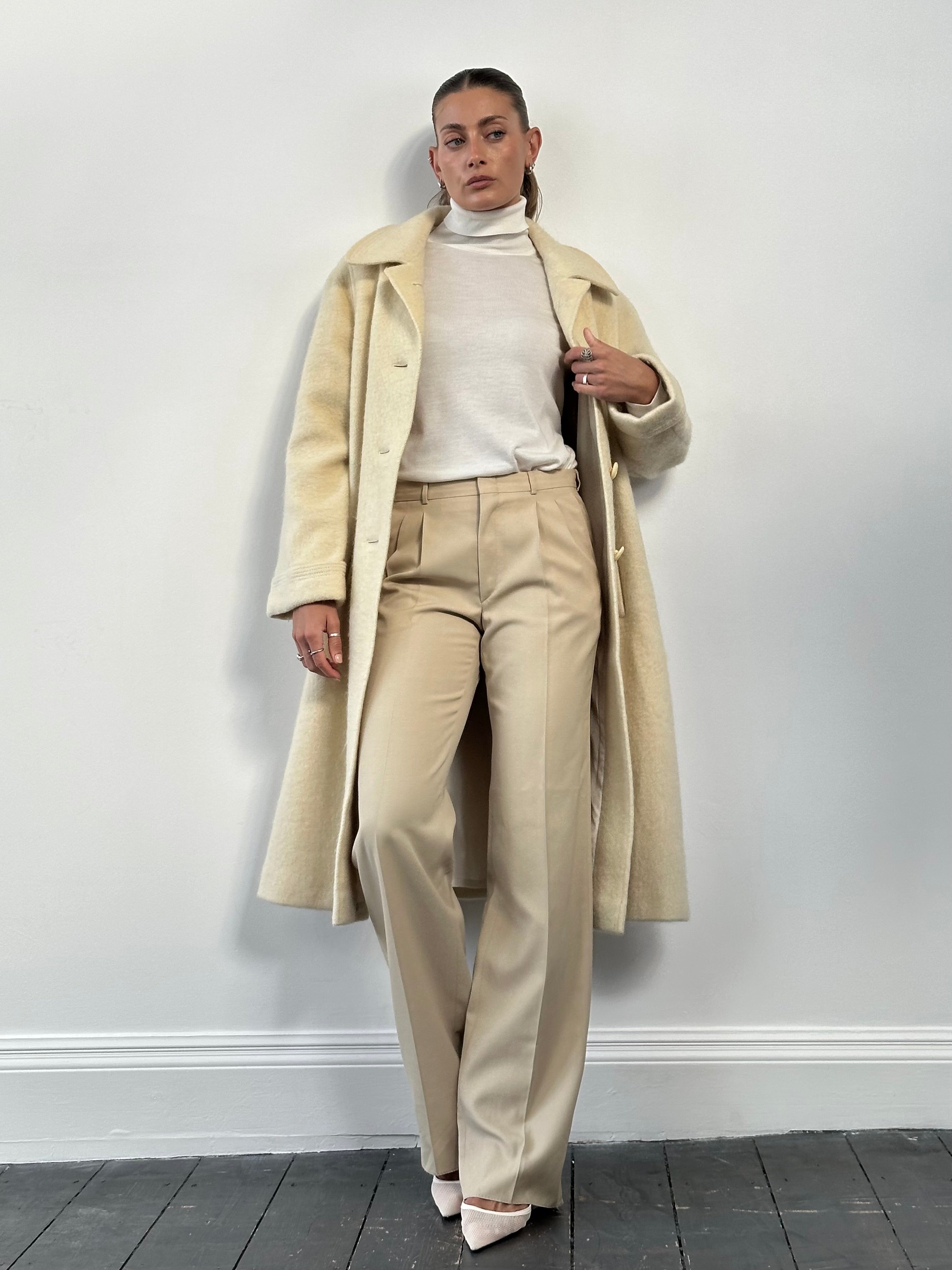 Vintage fuzzy wool mohair single-breasted coat in size large, with a classic design and textured fabric.