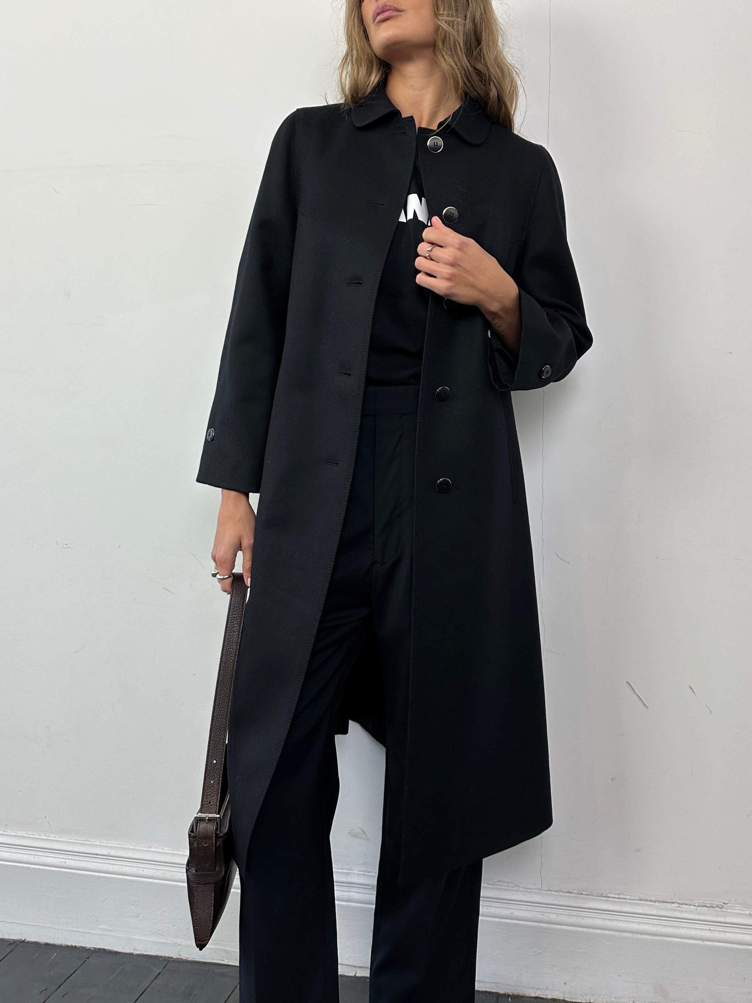 Vintage pure wool single-breasted A-line coat in size S, featuring classic design and tailored fit.