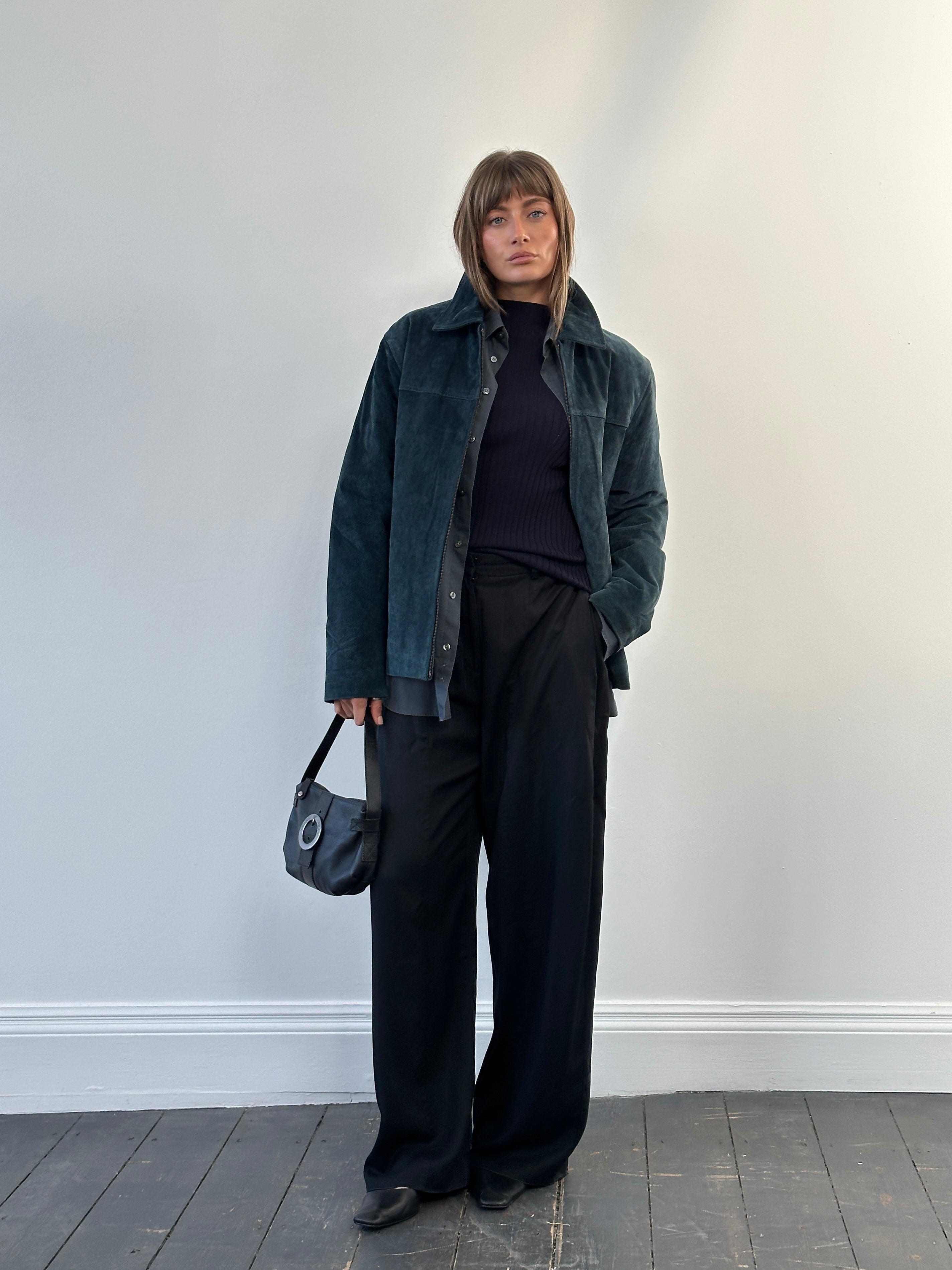 Balmain Paris 1990s suede zip leather jacket in size L featuring a stylish collar and zip closure, displayed on a mannequin.