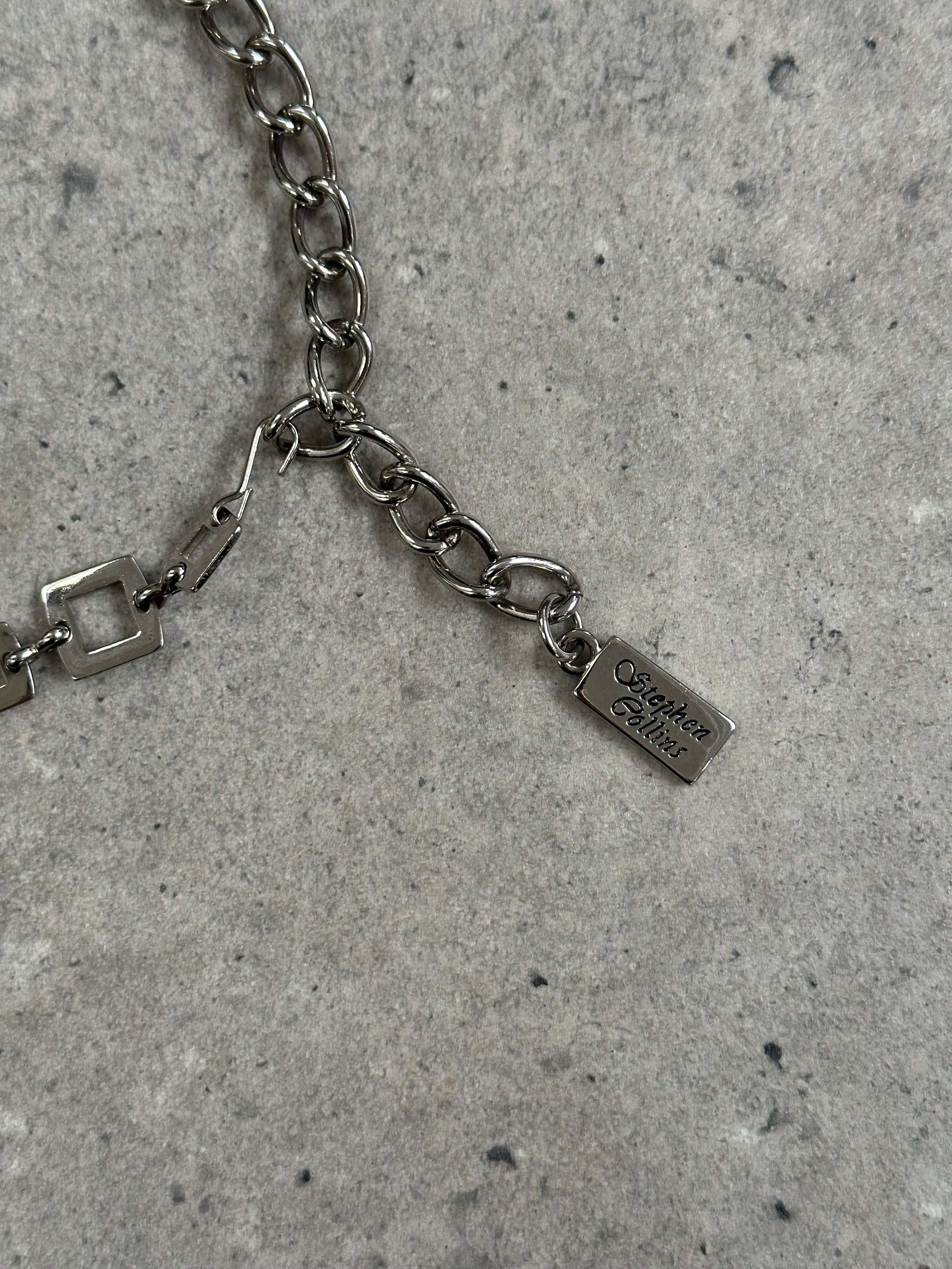 Vintage 1990s metal chain belt with large links, one size, featuring a classic, edgy design perfect for retro fashion styles.