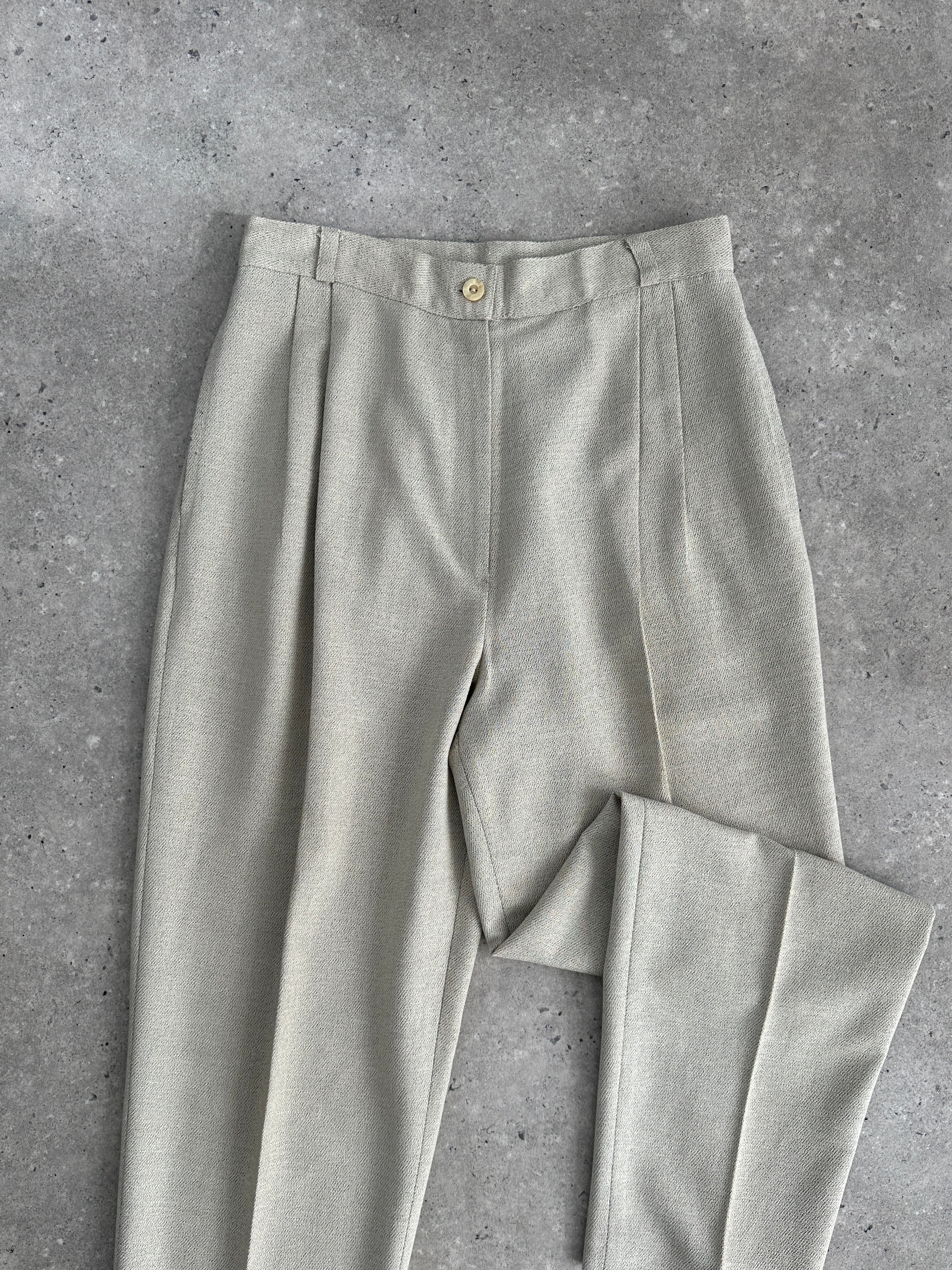 Italian Vintage high waist tapered leg tailored trousers in size W26, featuring a classic fit and vintage-inspired design.