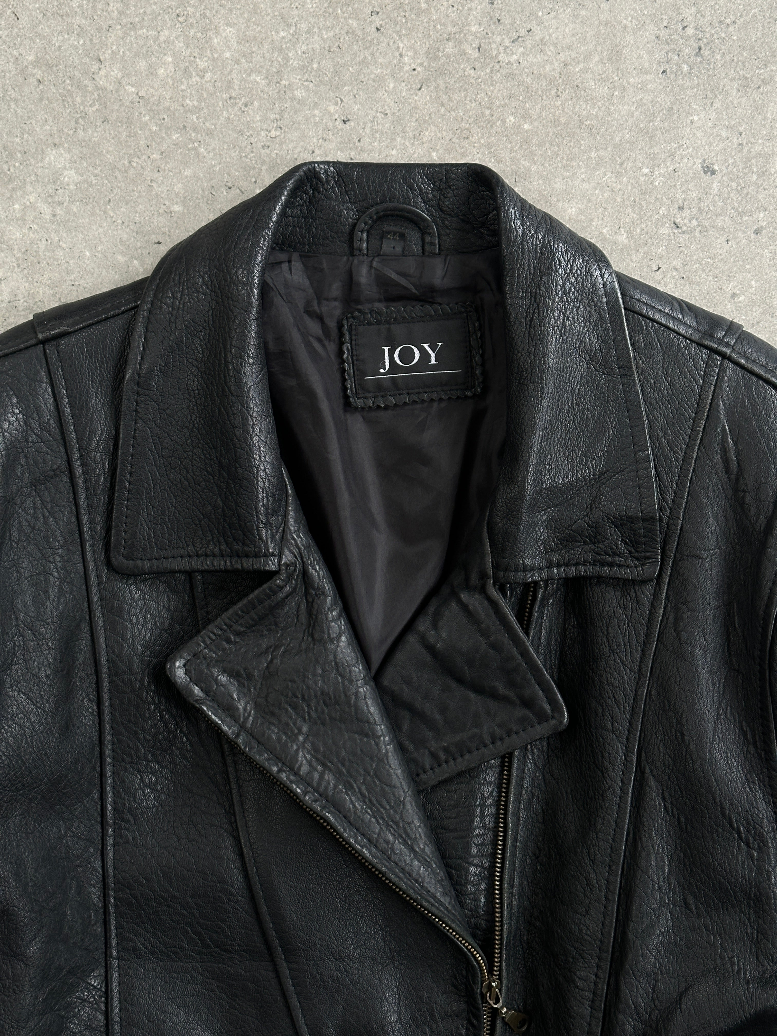 Vintage 1990s lamb leather belted jacket in XL, featuring classic style and quality craftsmanship.