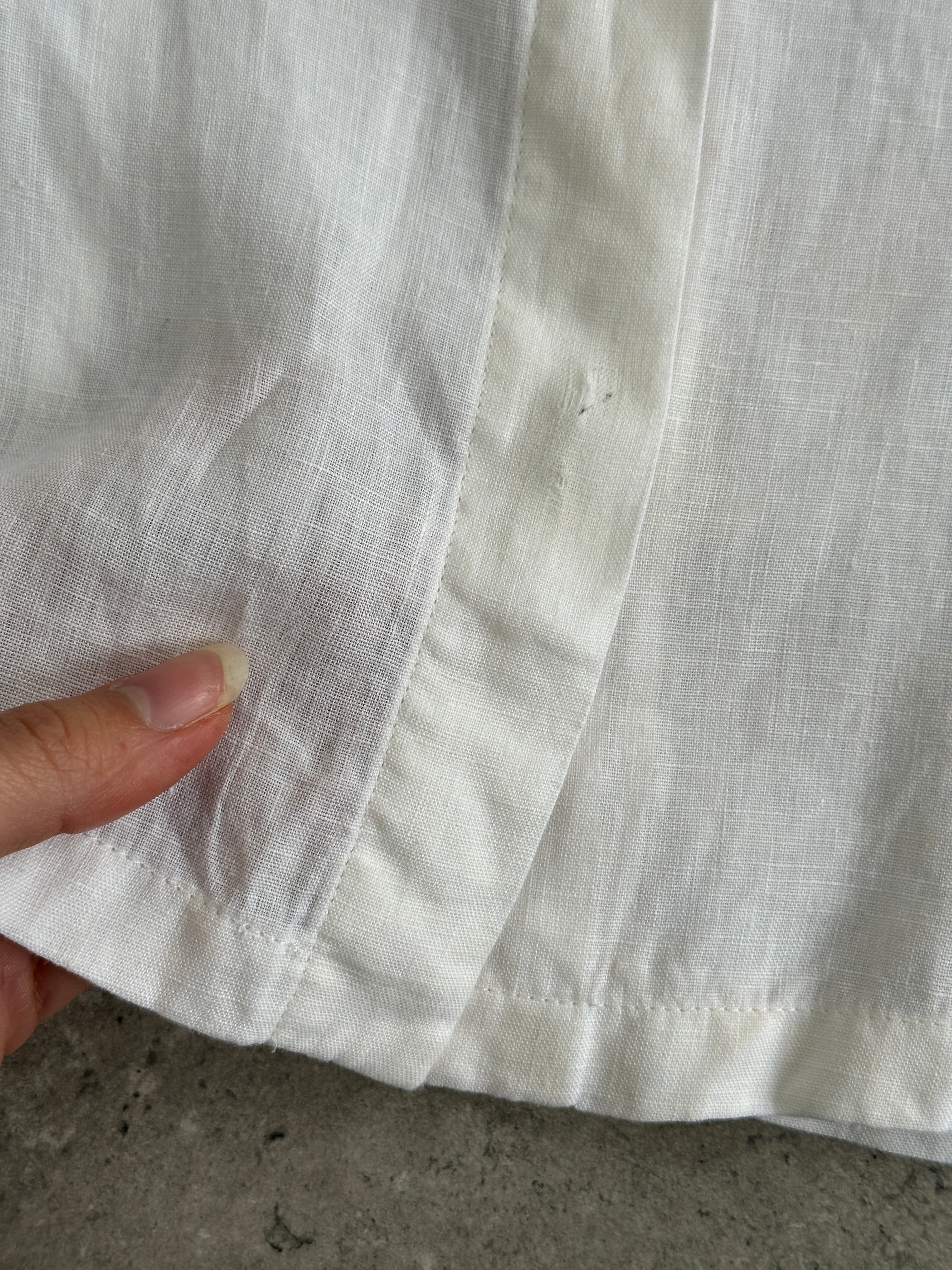 Max Mara pure linen short sleeve shirt in size small, shown hanging on a wooden hanger with a neutral background