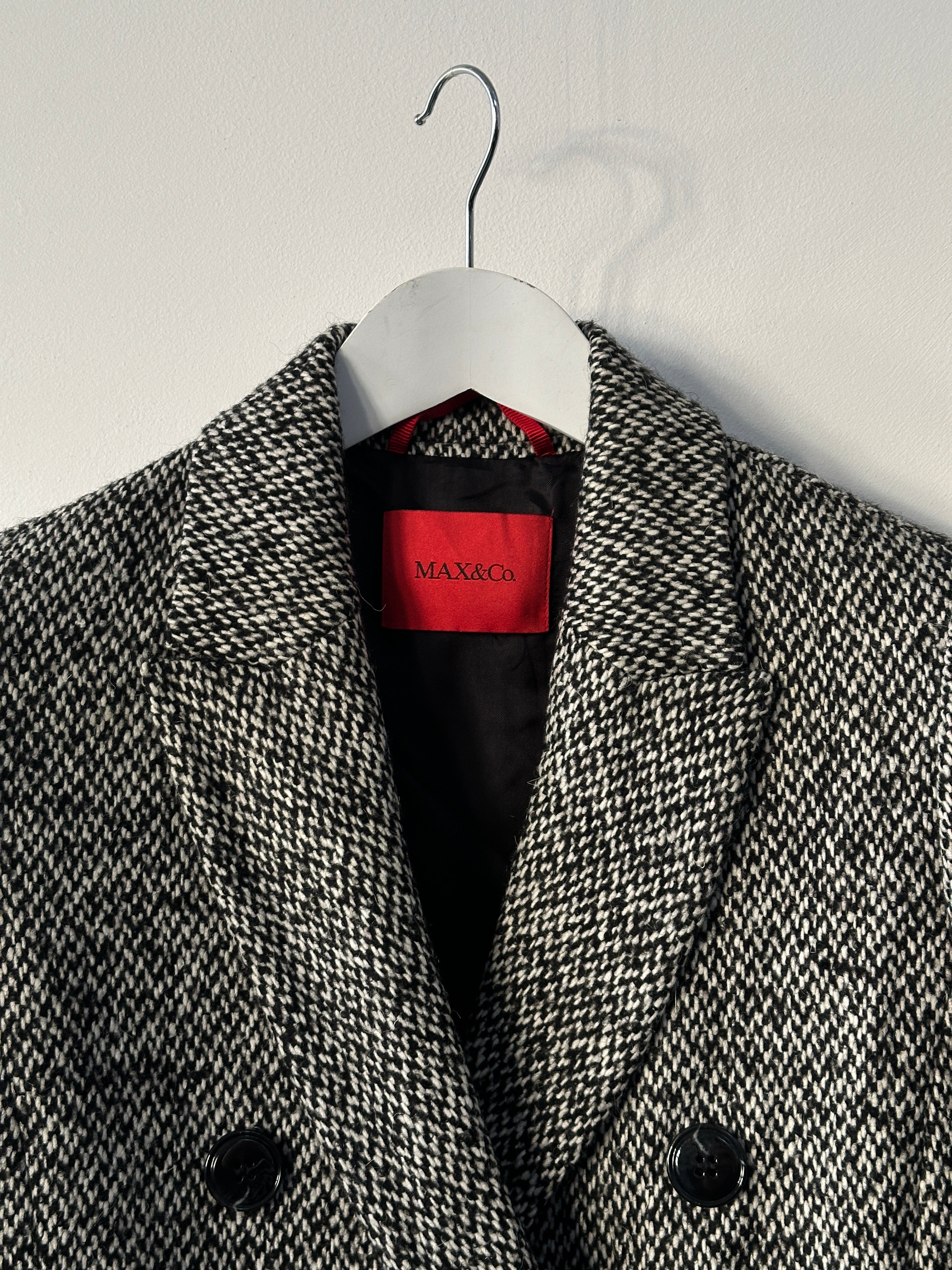 MAX & Co wool blend tweed double-breasted coat hanging on a wooden hanger, showcasing classic tailored design and textured fabric.