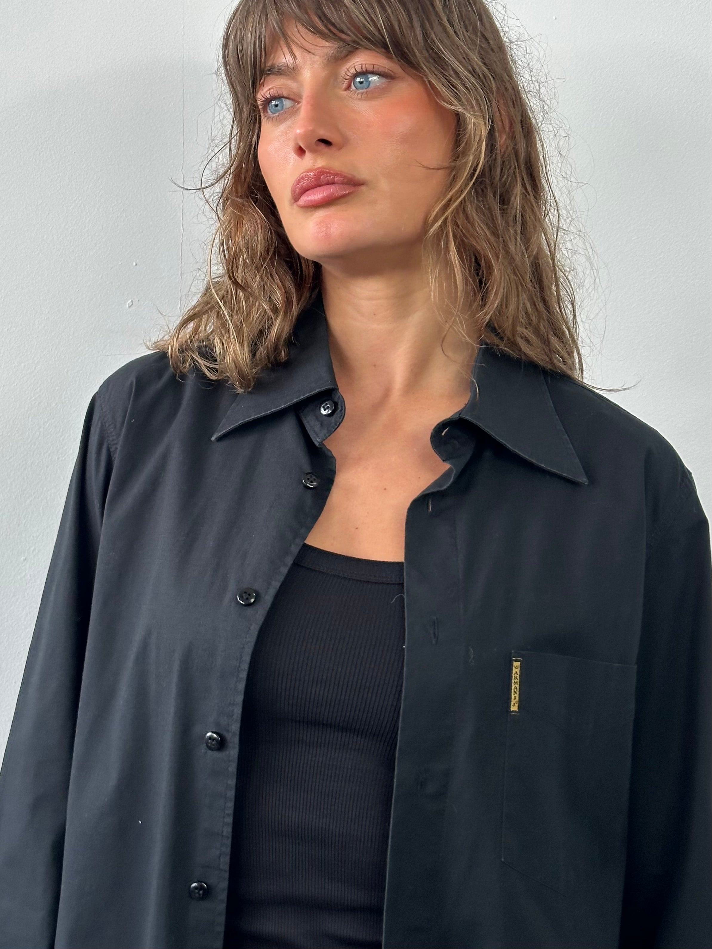 Armani Jeans 2000s cotton logo shirt in size M, featuring the iconic Armani branding and classic button-up design.