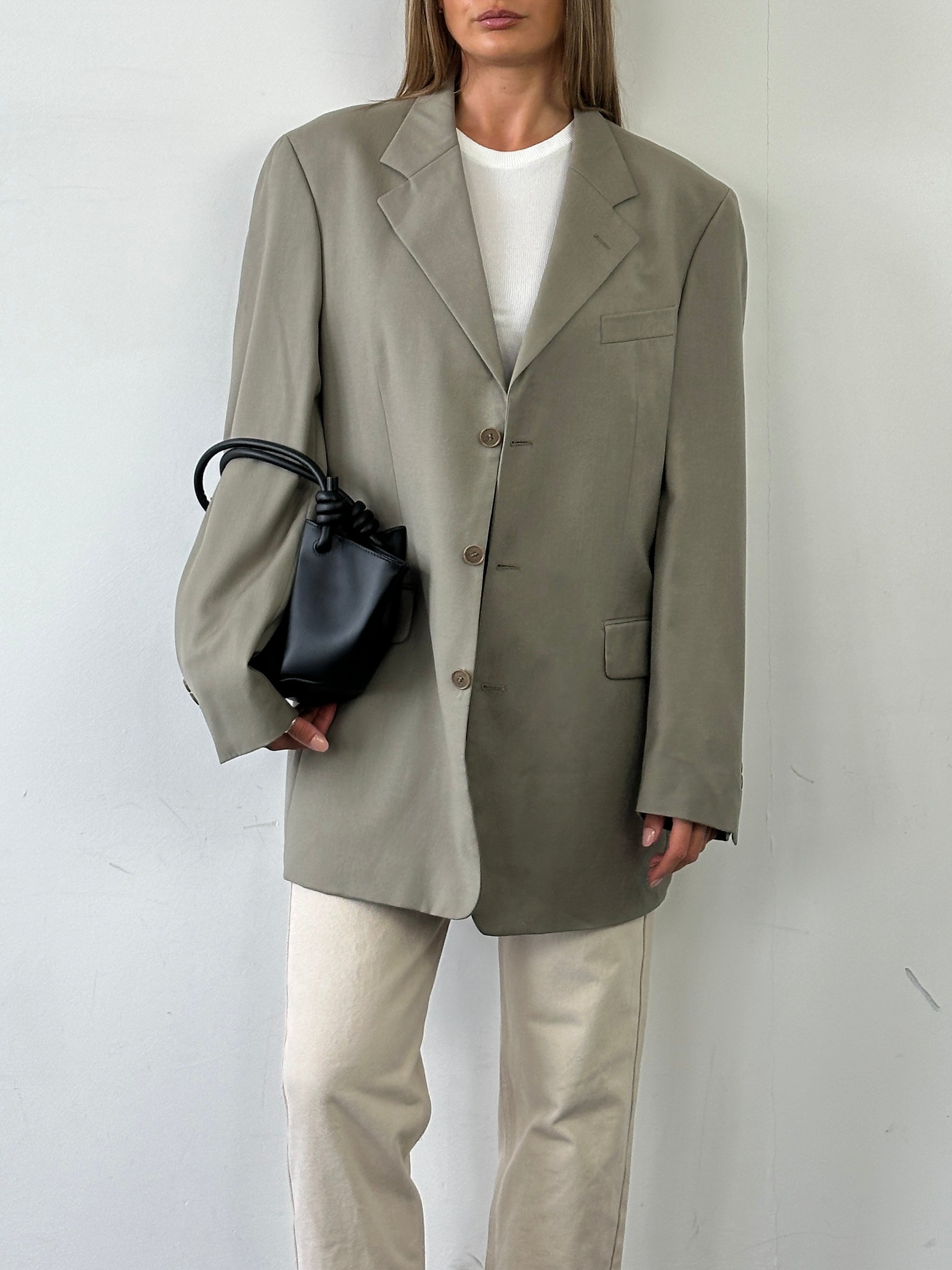 Yves Saint Laurent Pour Homme pure wool single-breasted blazer in XL, tailored fit with classic lapel and structured design.