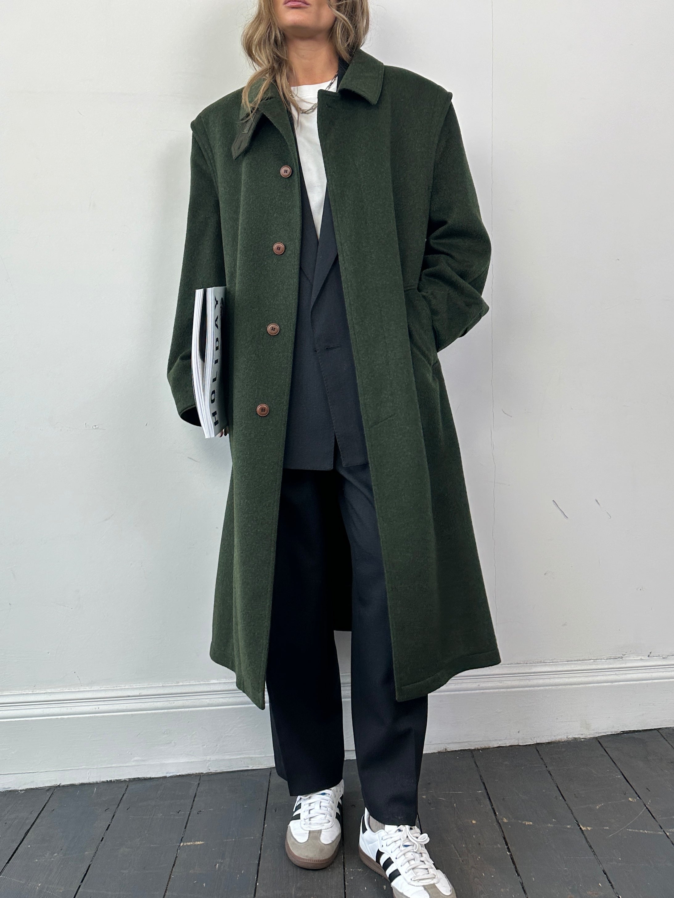 Vintage wool coat with concealed placket, single-breasted design, in XL size, showcasing classic style and textured fabric.