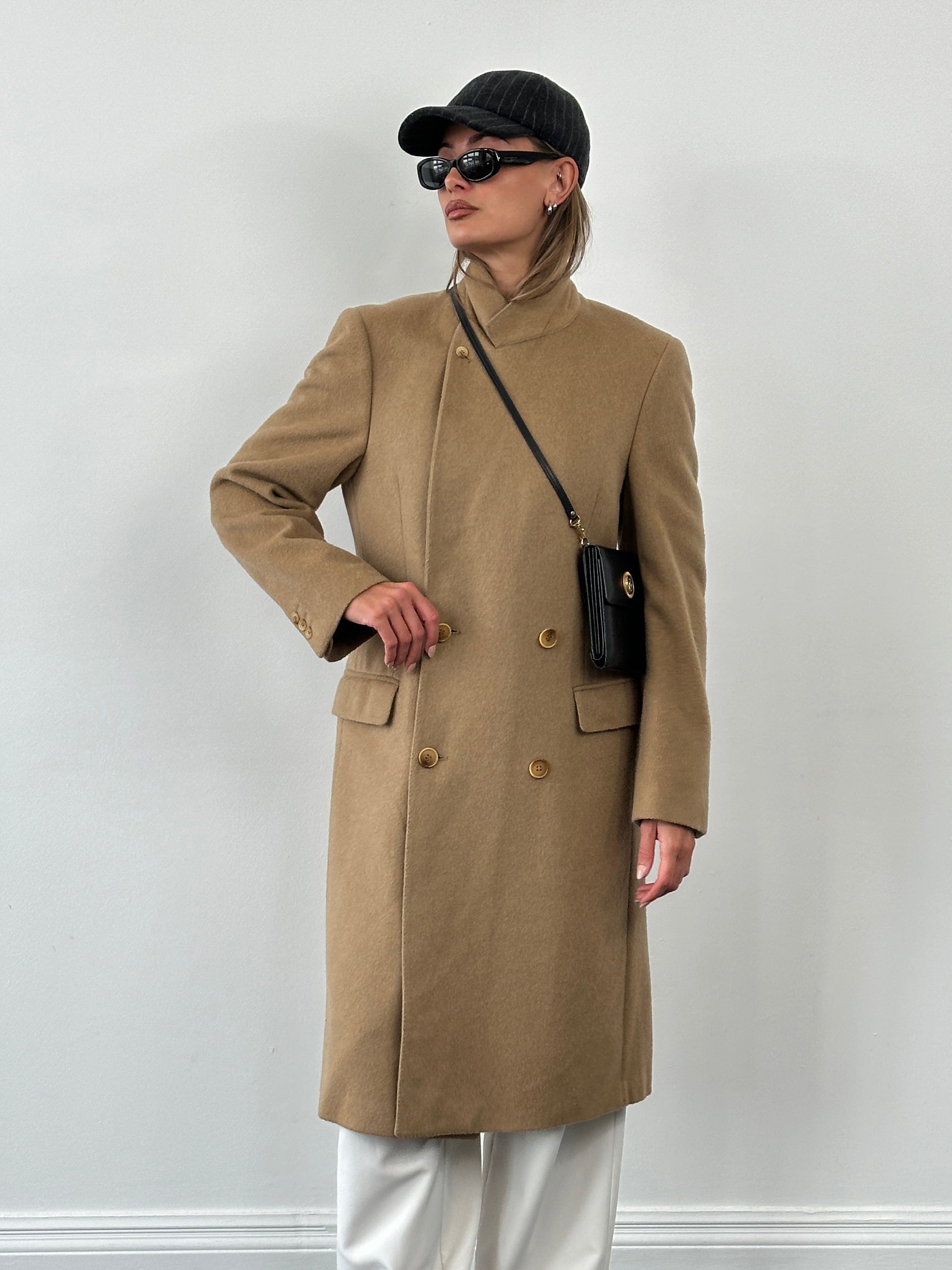 Vintage 1990s wool double-breasted high-neck coat in size L, featuring classic design and warm, textured fabric.