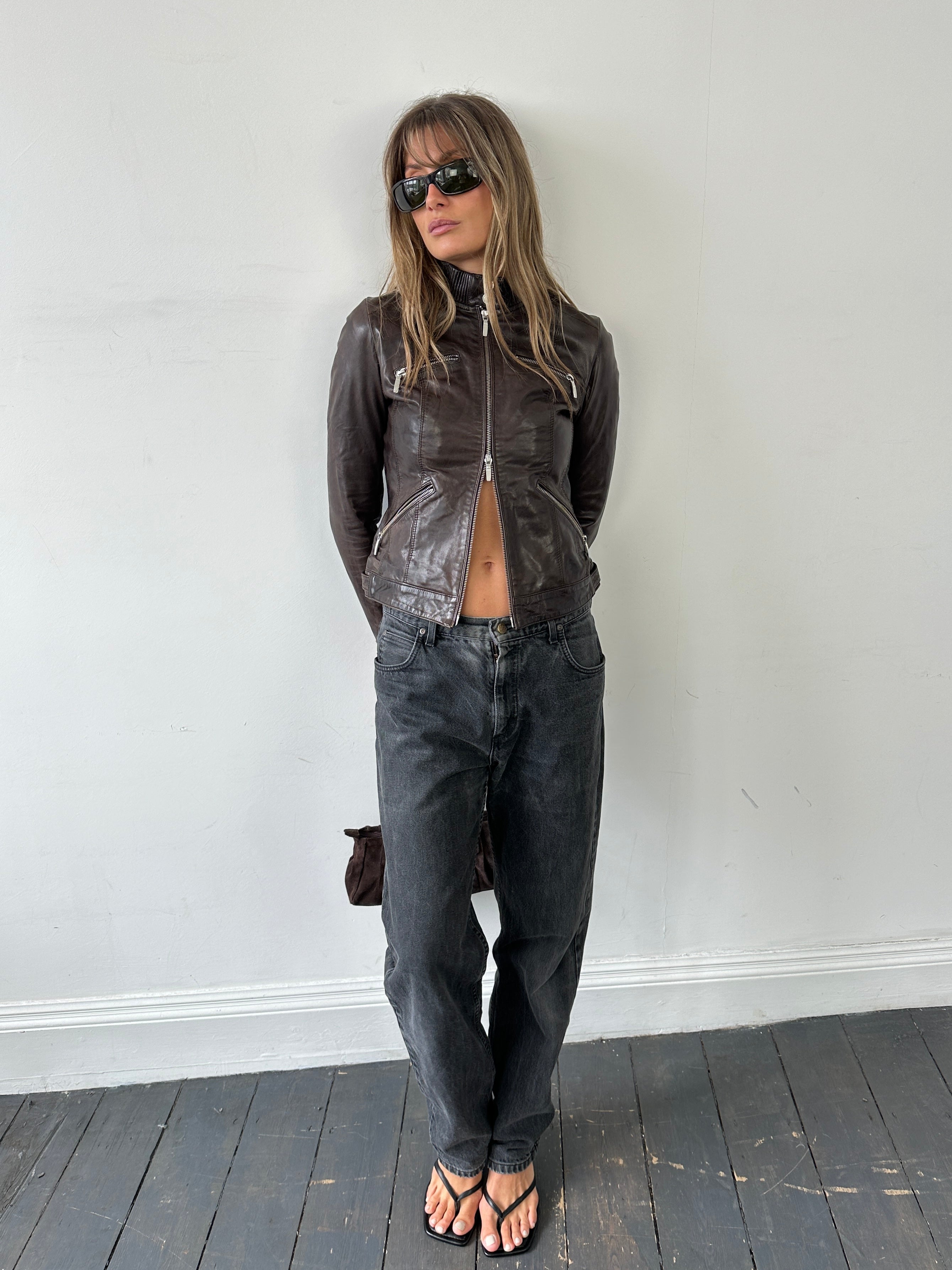 Vintage double zip fitted leather biker jacket in XS/S, featuring classic design and durable leather construction.