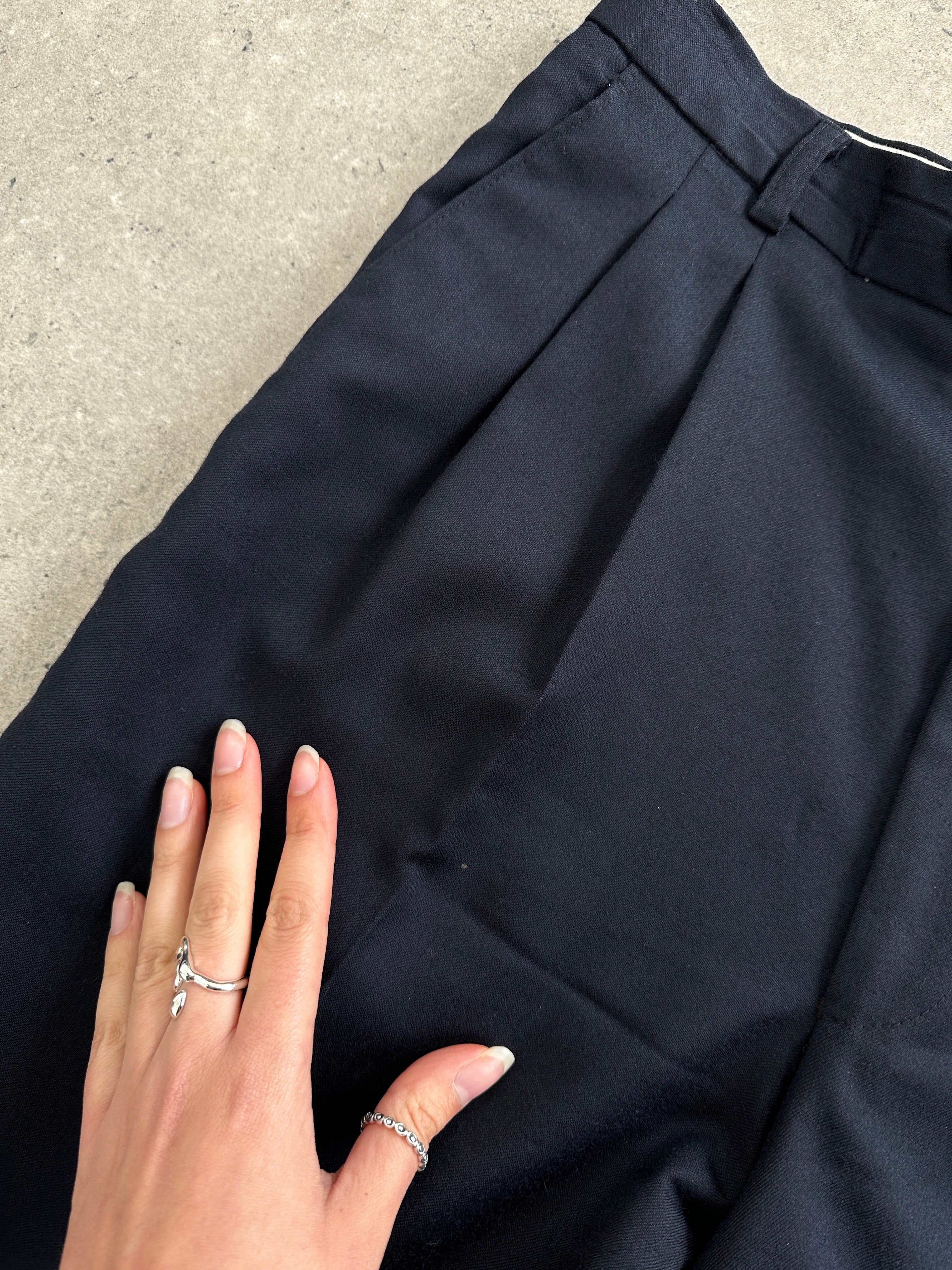 Vintage pure wool straight leg tailored trousers in size W32, showcasing a classic fit with a structured waistband and clean front design.