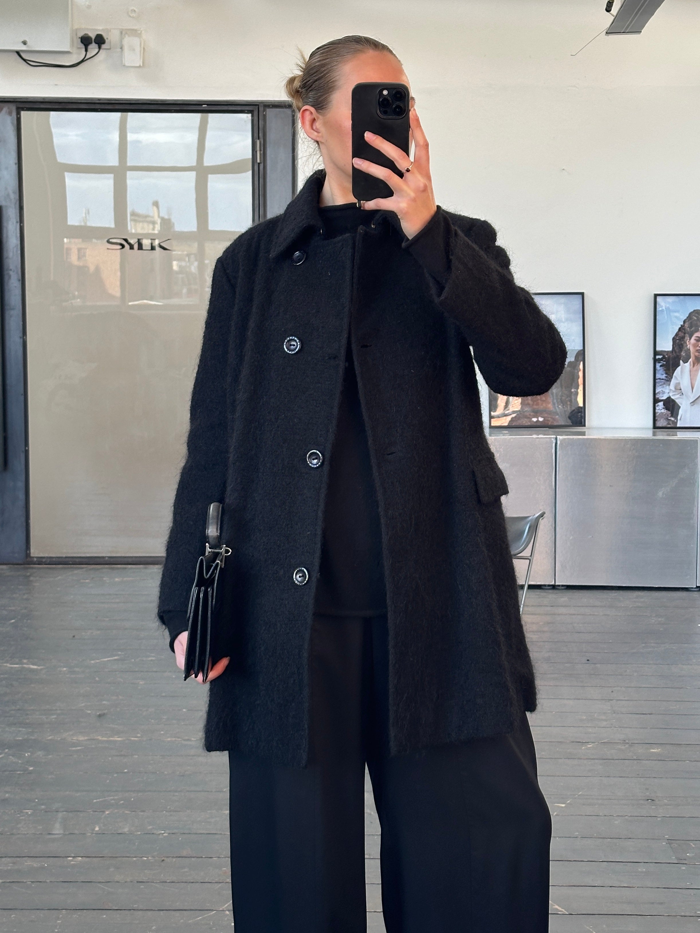 Trussardi 2000s virgin wool mohair single-breasted coat in size M, beige color, displayed on a hanger.