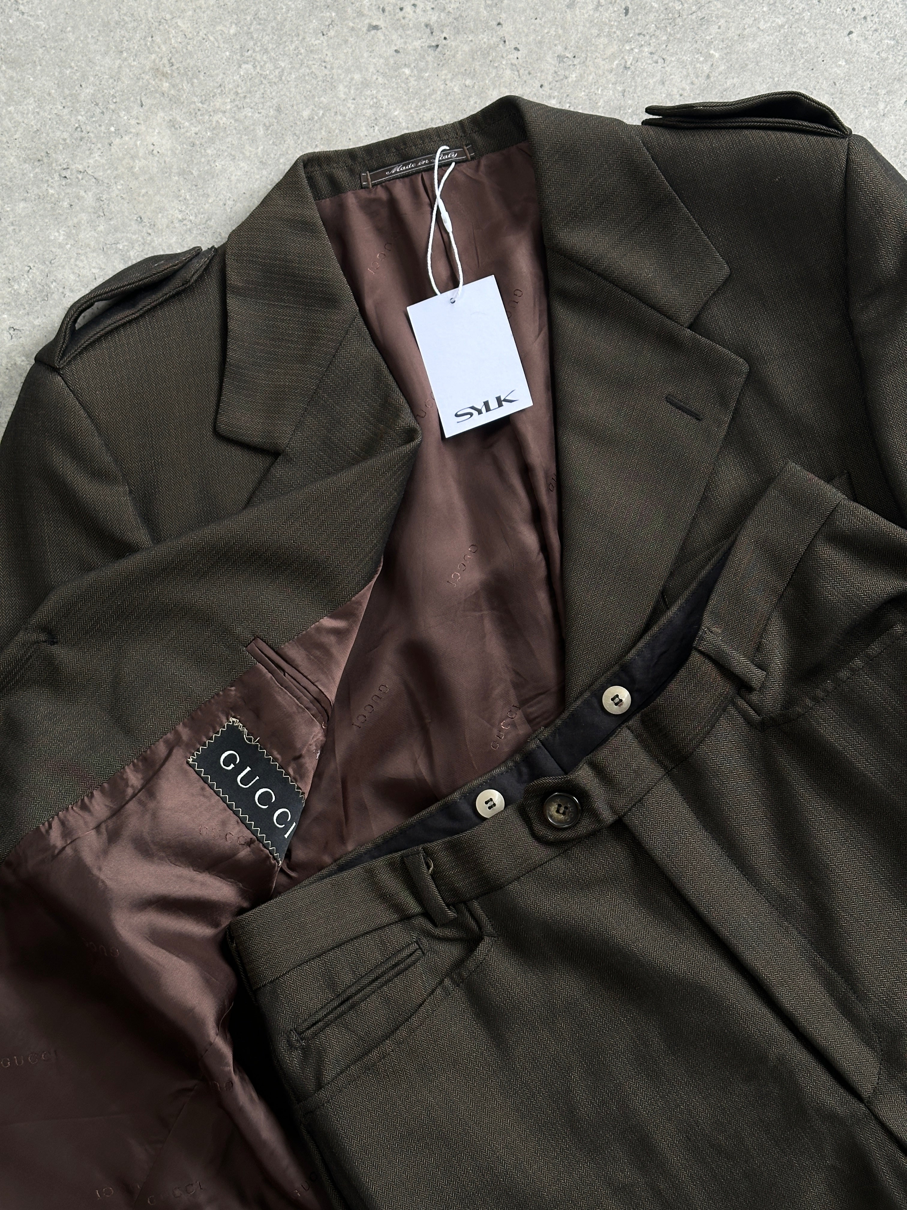 Gucci wool mohair single-breasted jumpsuit in size 40L/W30, tailored fit with classic lapel and sleek design.