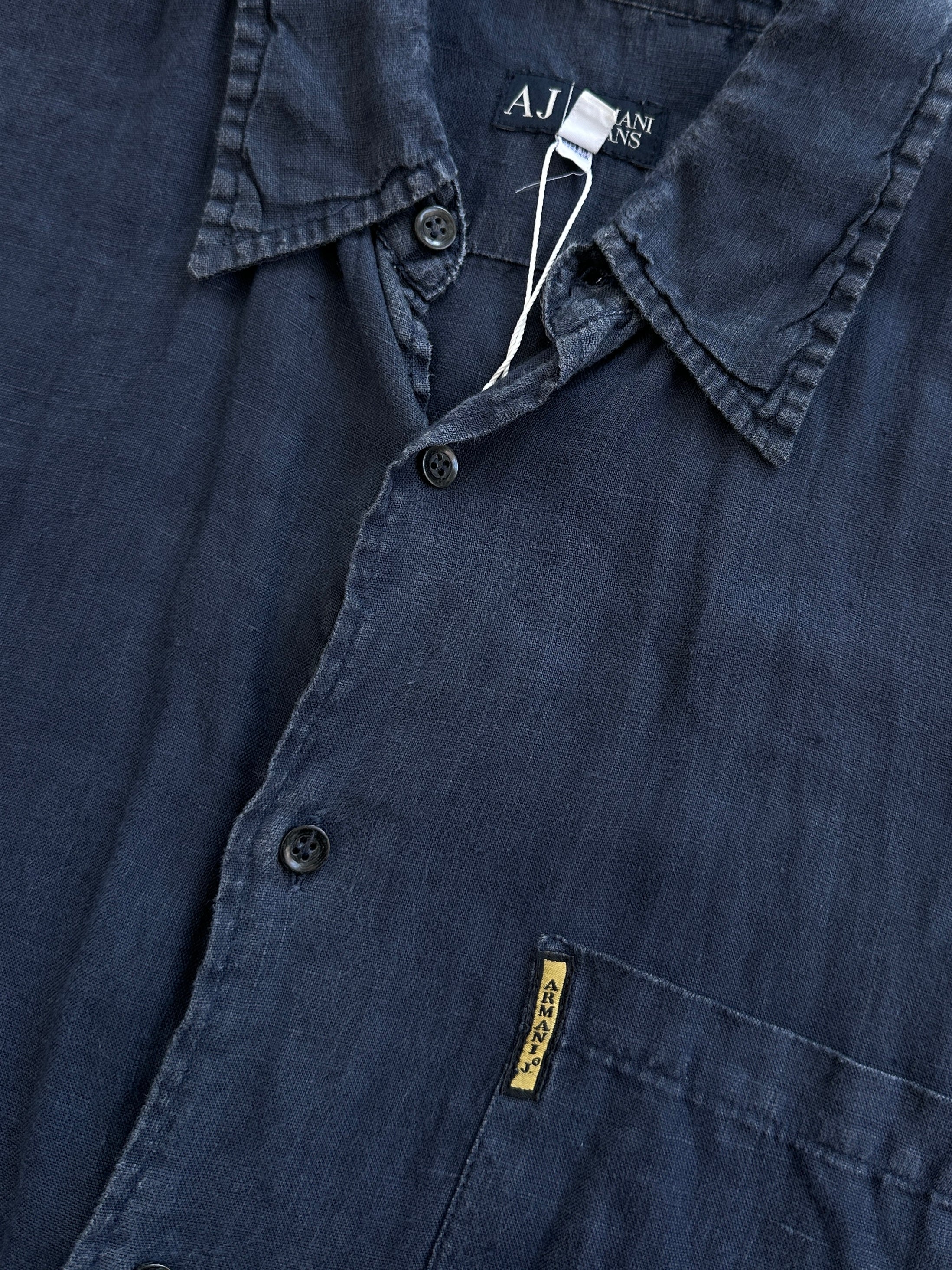 Armani Jeans pure linen short sleeve shirt in size L, featuring a classic design and lightweight fabric for a casual look.