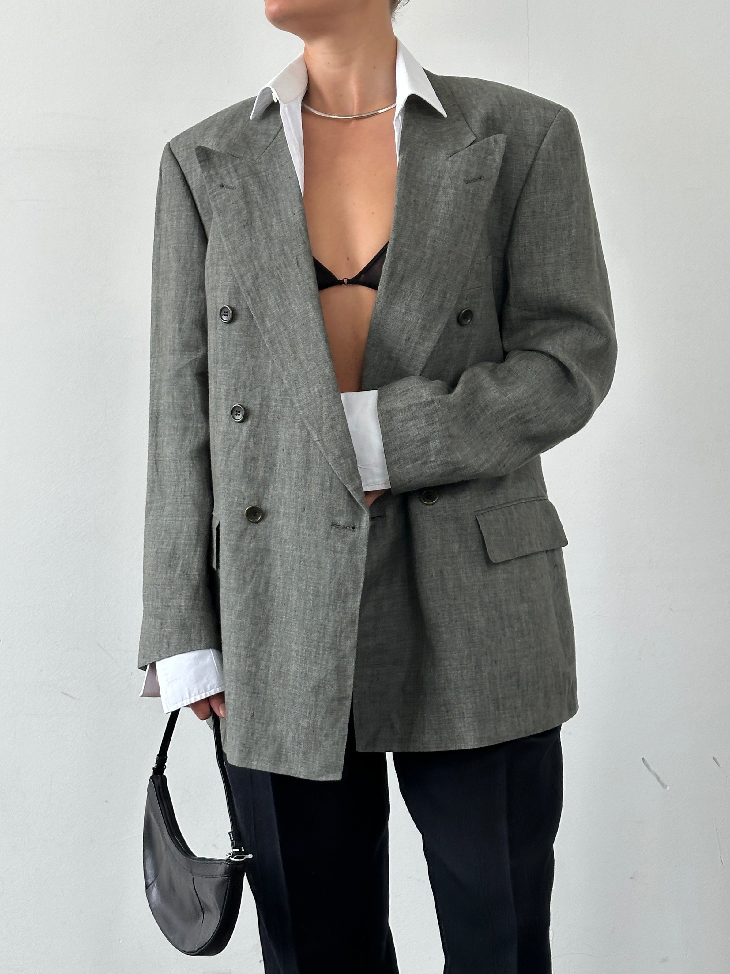 Hugo Boss pure linen double-breasted blazer with large lapels in size 40R/XL, shown in a tailored fit on a neutral background.