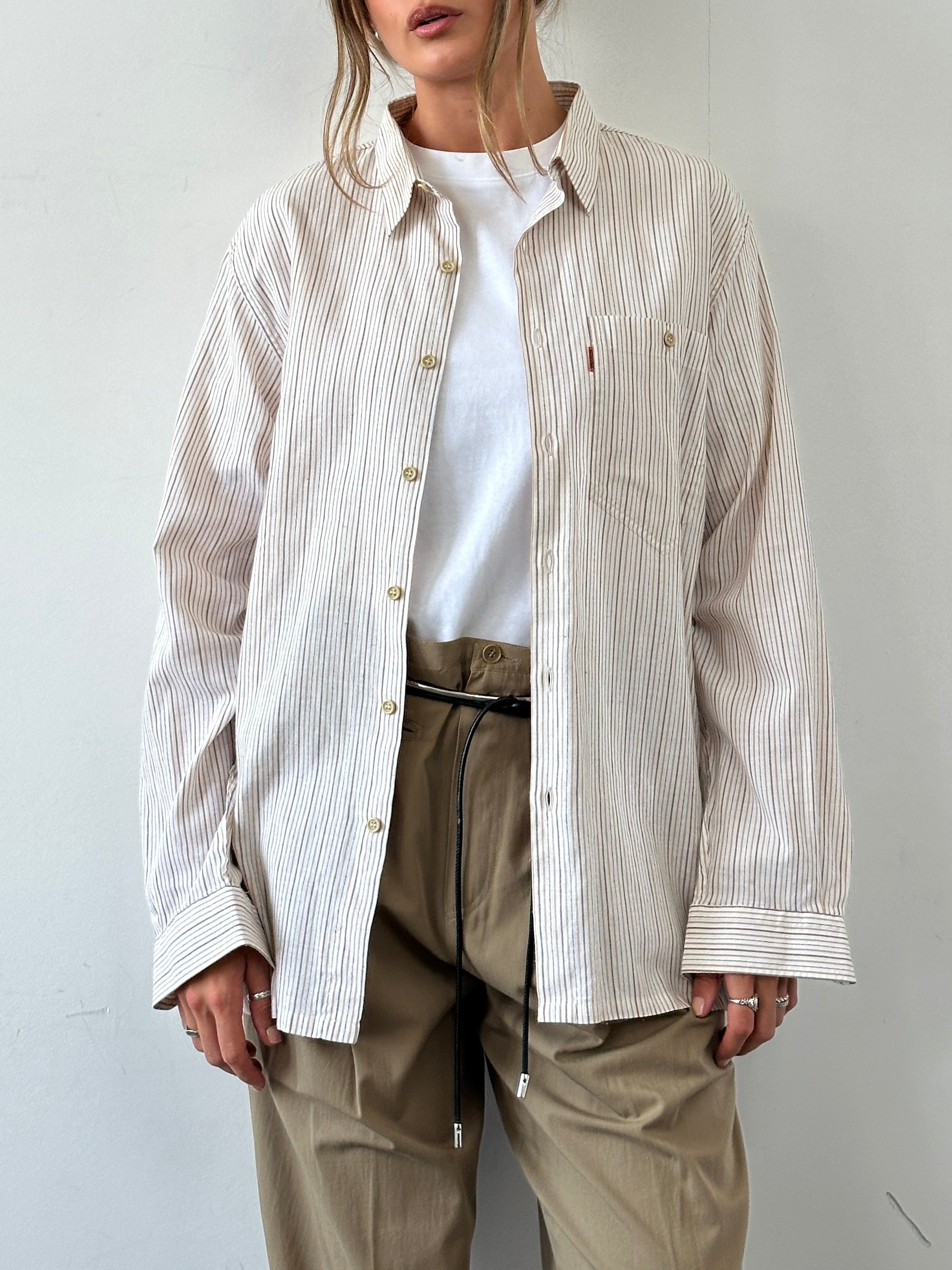Missoni 90s cotton stripe shirt in size L/XL, featuring colorful horizontal stripes and classic button-up design.