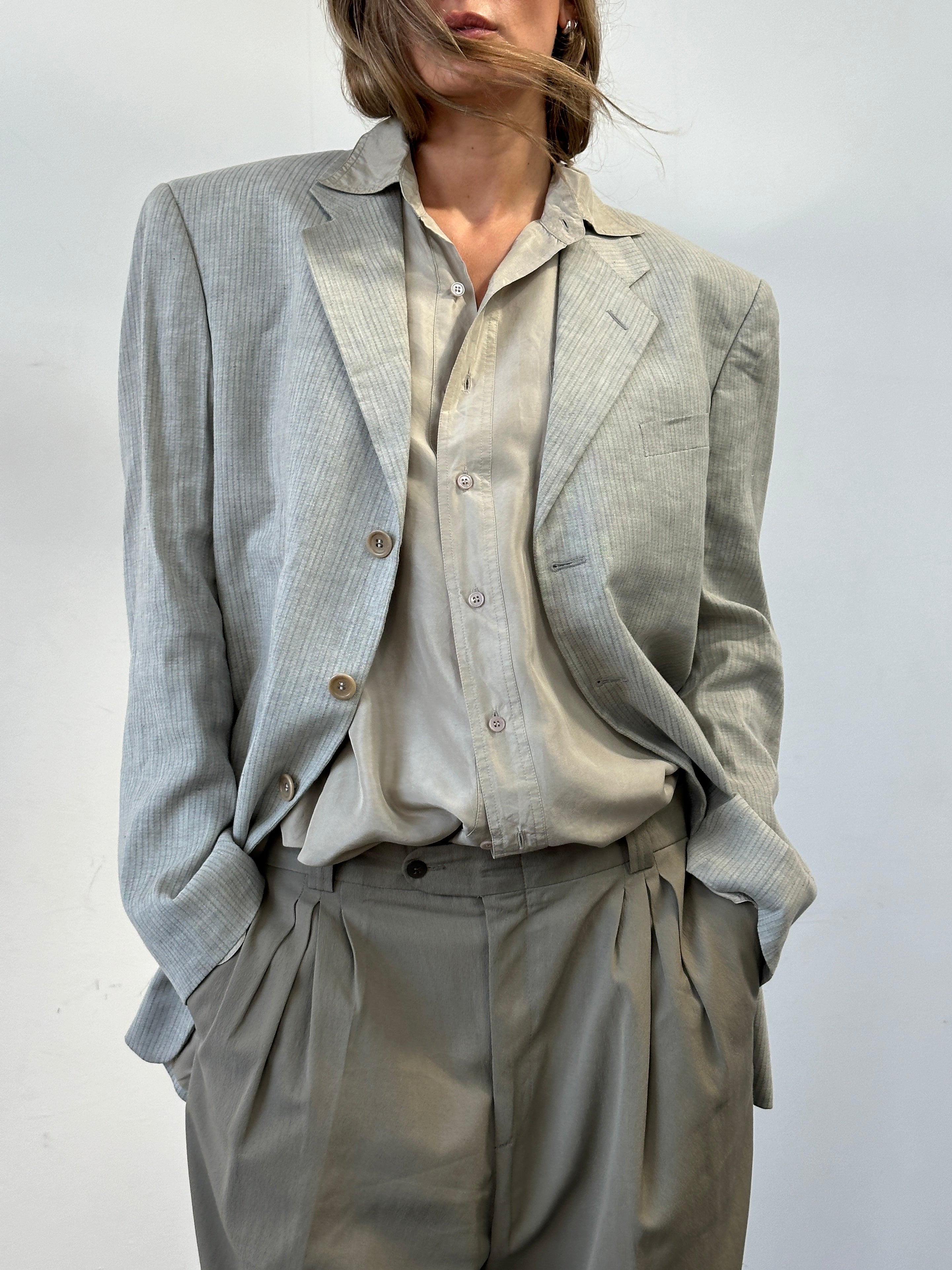 Armani Collezioni striped linen cotton blazer in relaxed fit, size 42R/XL, shown on a hanger with a tailored design.