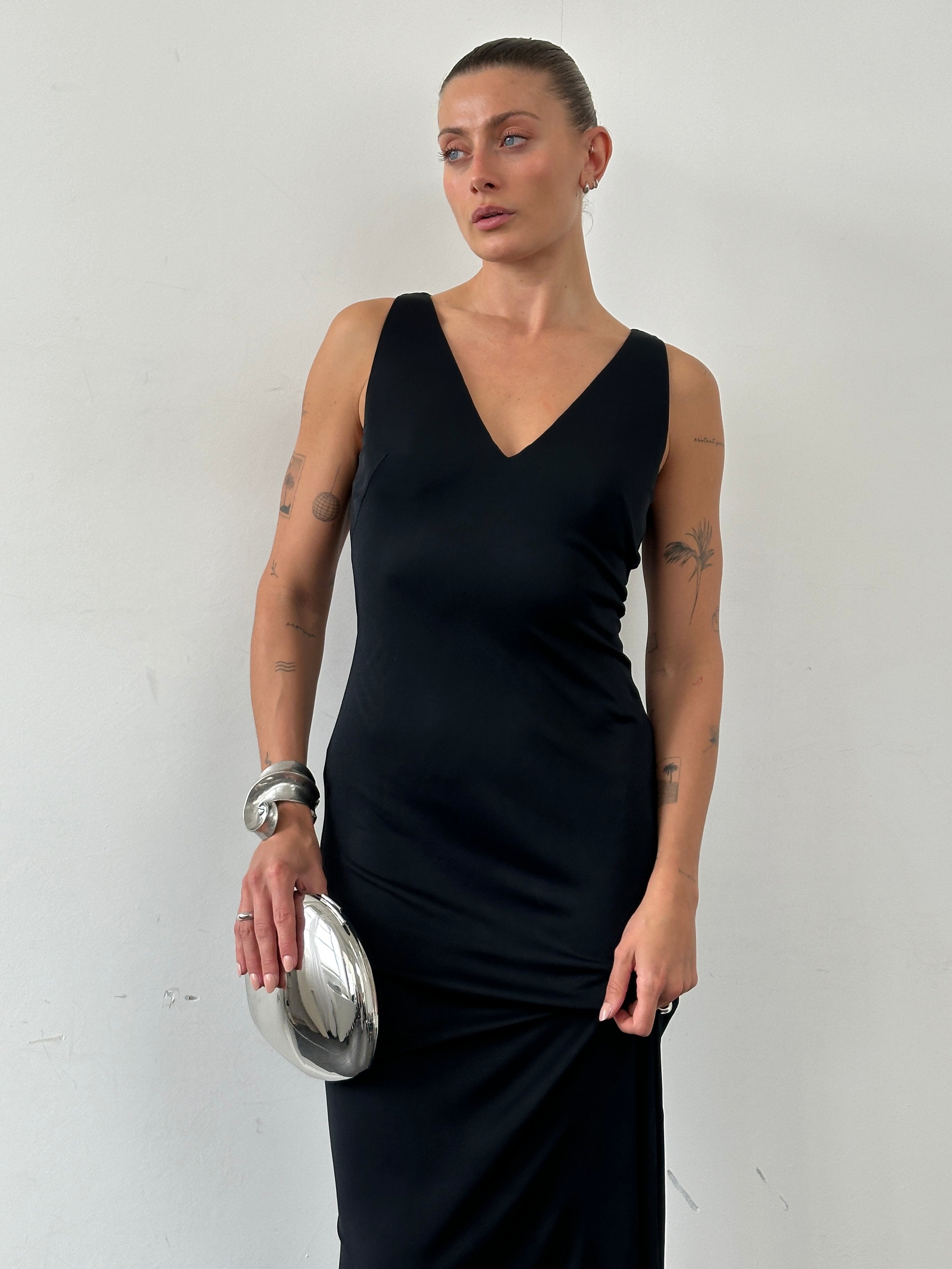 Elegant La Perla fitted floor-length maxi dress in black, showcasing smooth fabric and flattering silhouette.