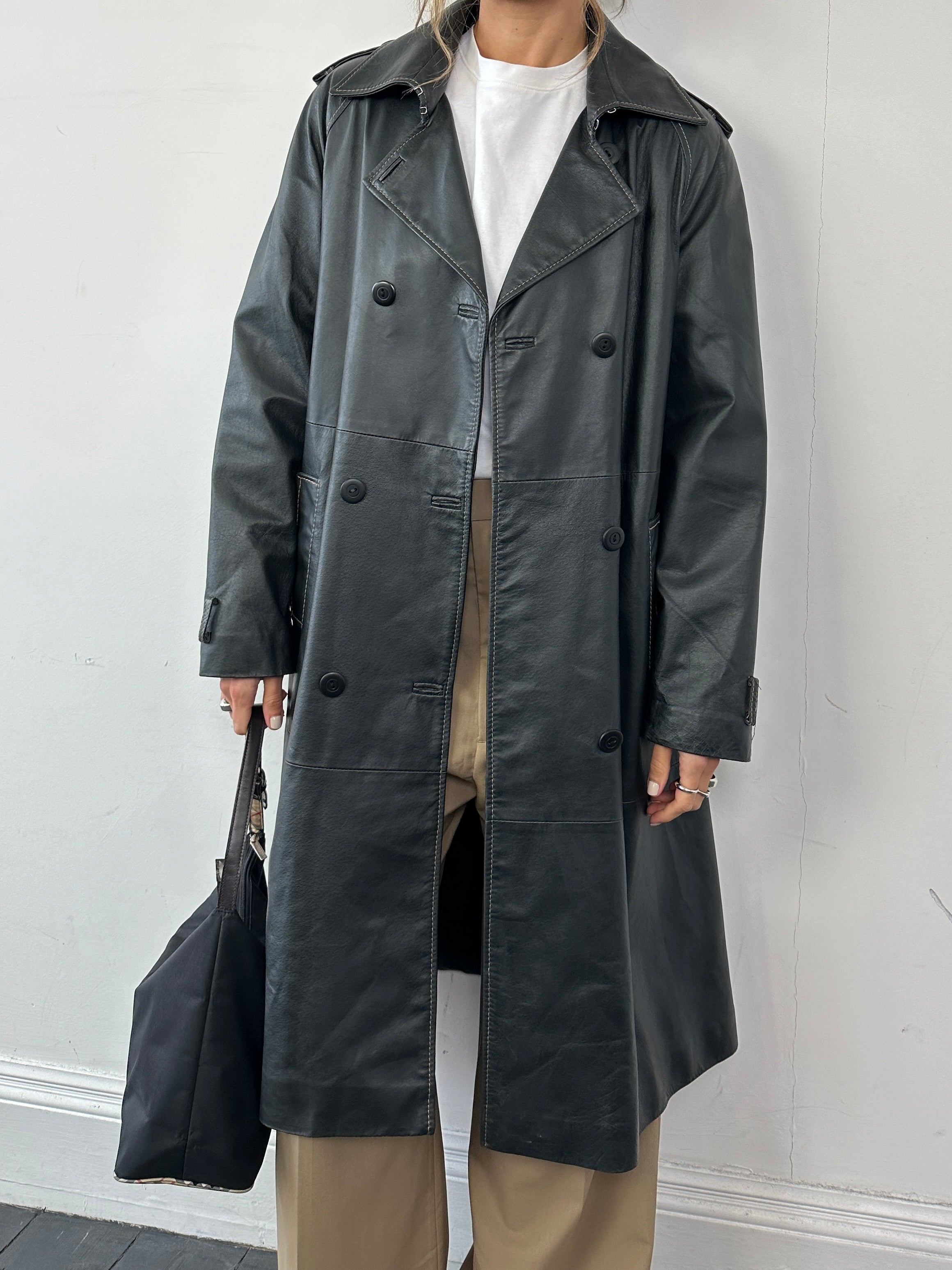 Conbipel contrast stitch double-breasted leather trench coat for men, featuring sleek design and stylish details.