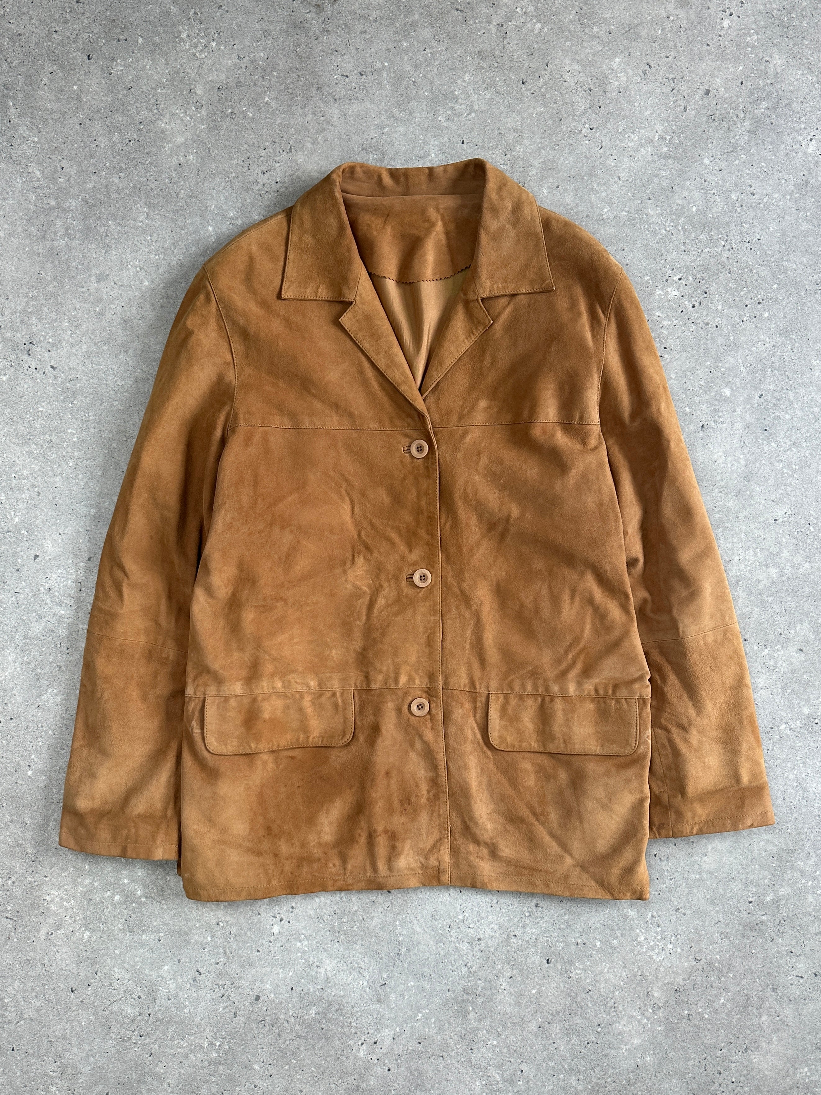 Vintage suede leather jacket in size M/L with a classic fit, featuring a collar and button details, stylish and timeless.