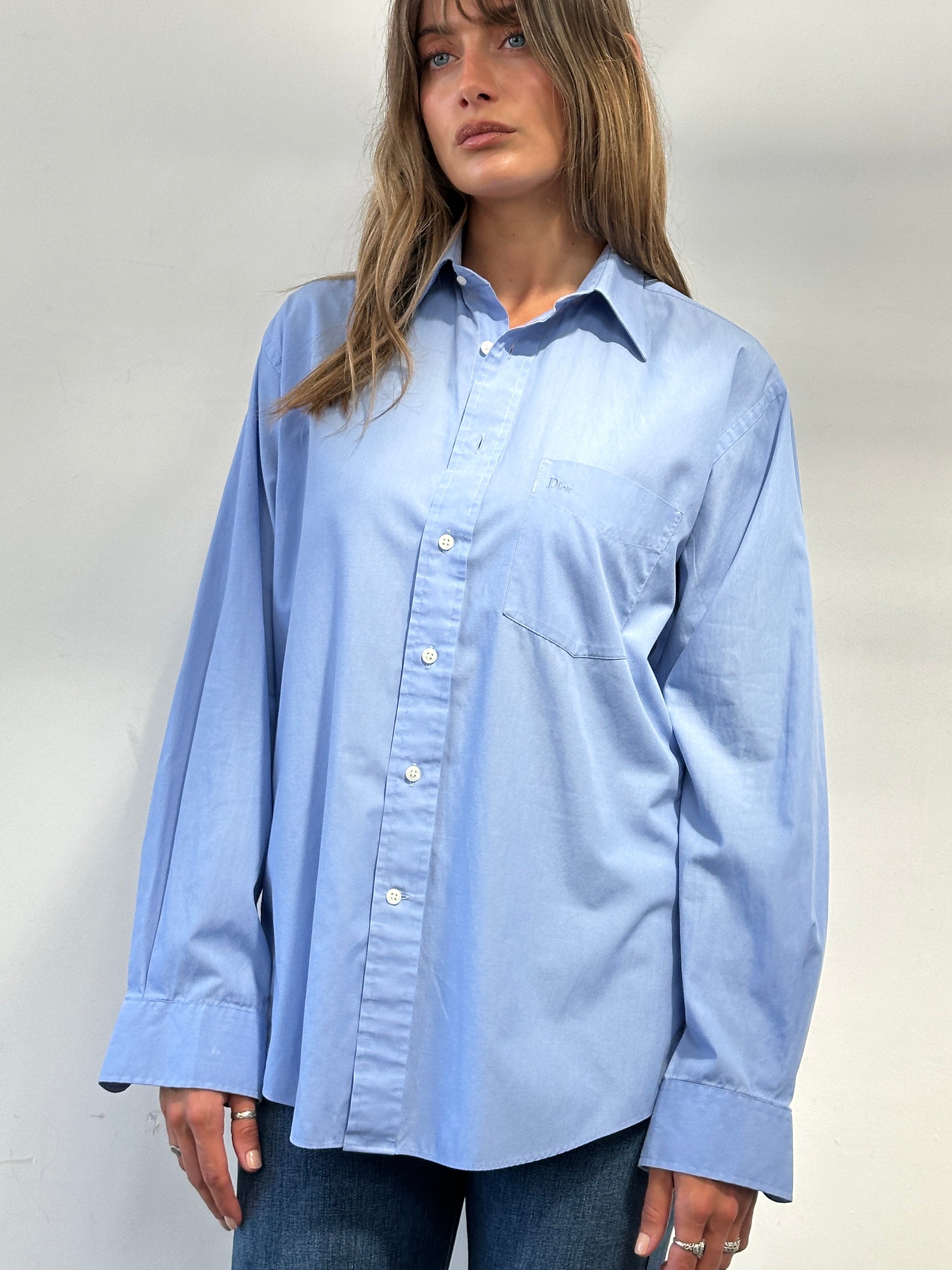 Christian Dior Monsieur cotton logo shirt in size L, featuring the signature Dior branding and classic design, displayed on a mannequin.