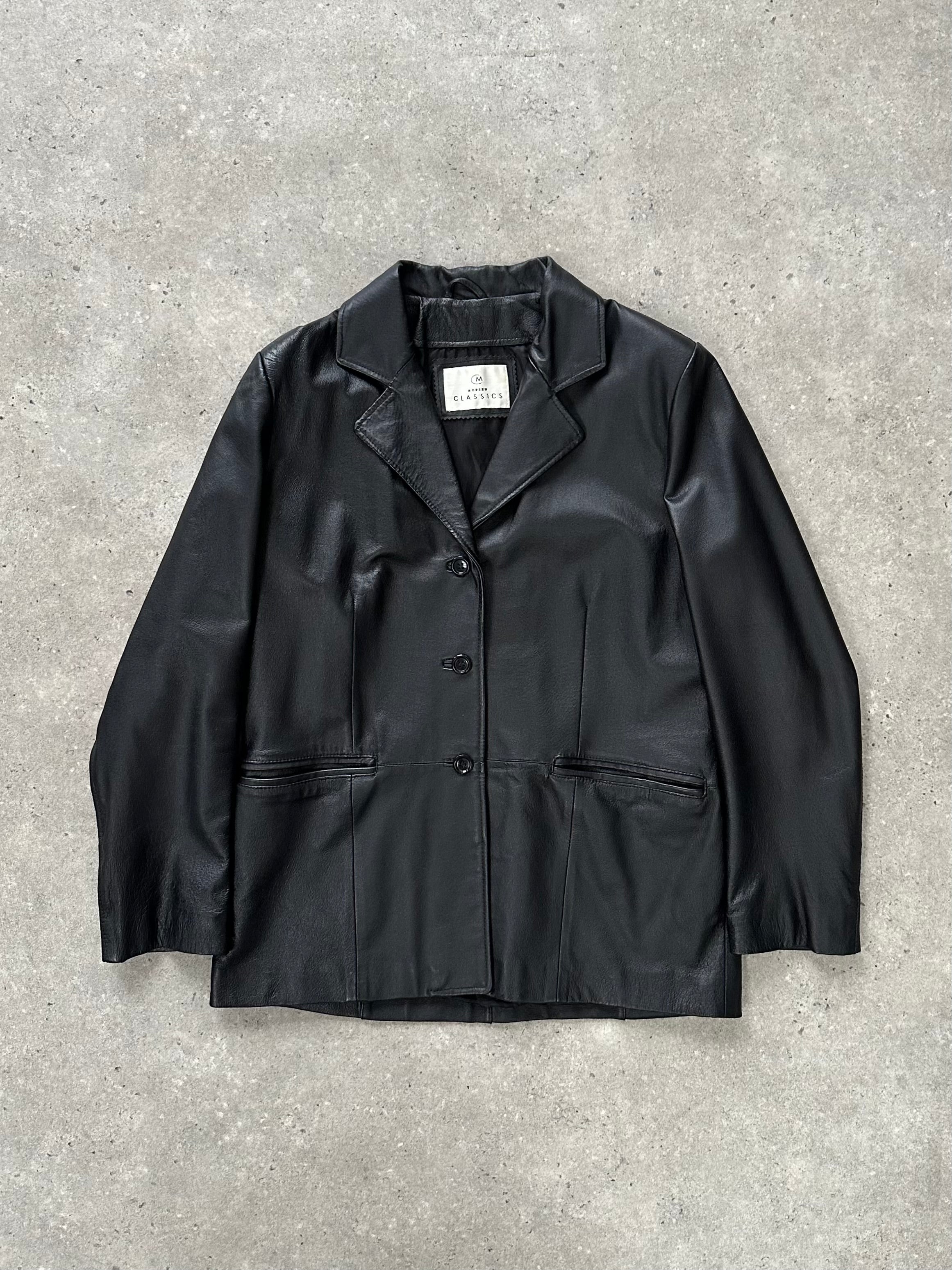 Vintage 1990s minimal leather jacket in size M, showcasing sleek design and classic black leather with simple detailing.