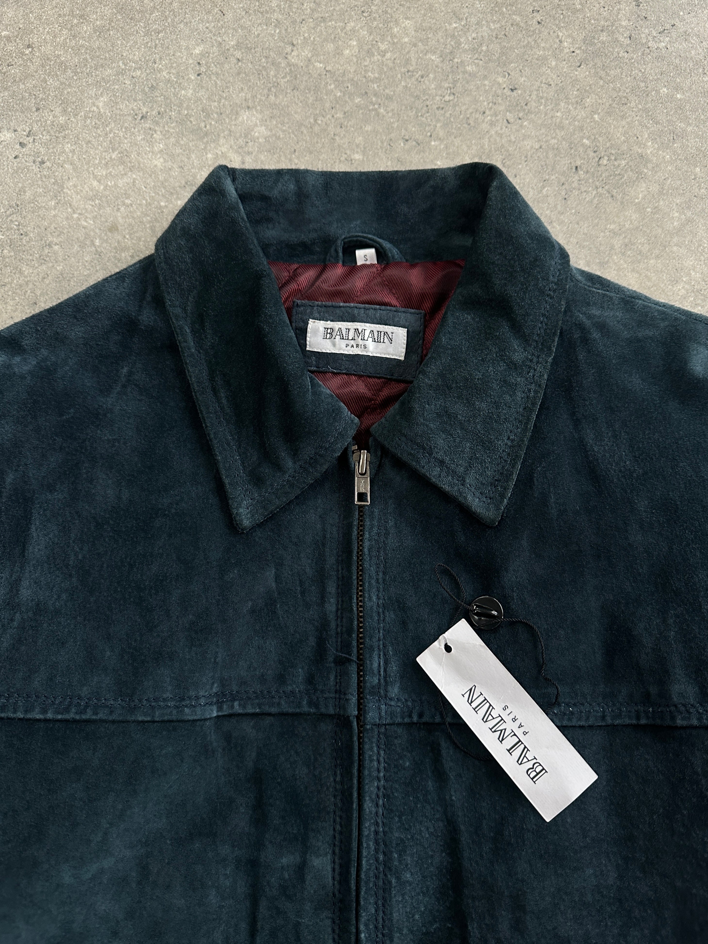 Balmain Paris 1990s suede zip leather jacket with front zipper and classic design, size large, shown on a hanger.