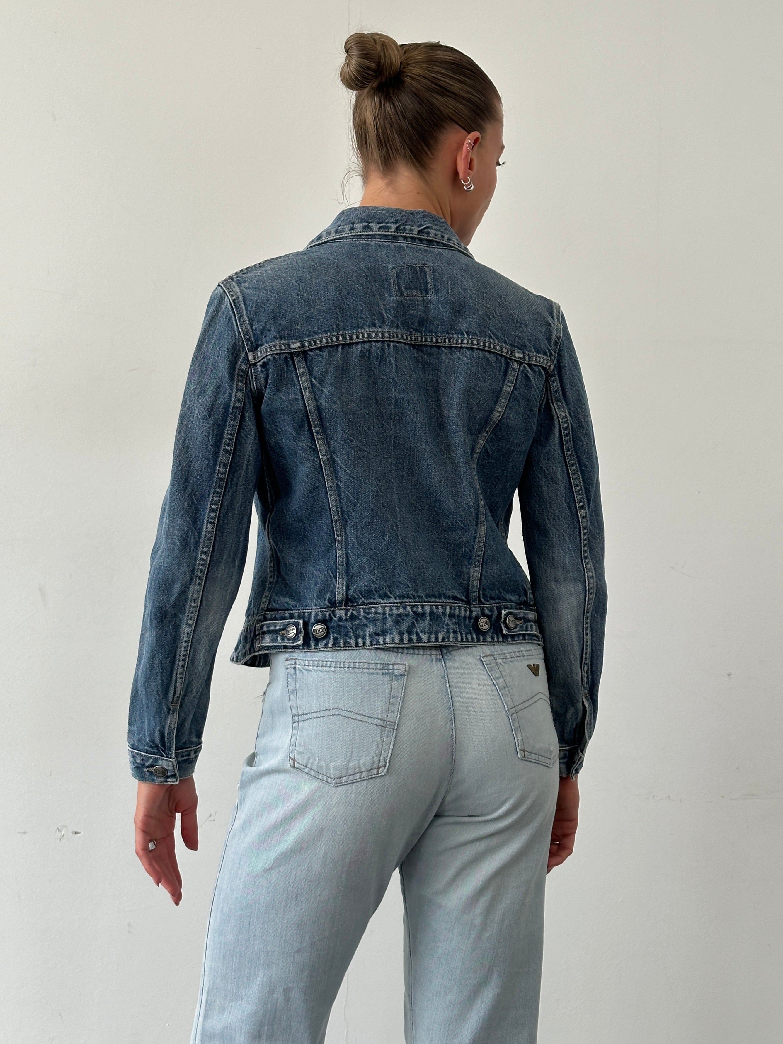 Gas fitted pure cotton denim jacket in size S, featuring classic blue denim fabric with front pockets and button closure.
