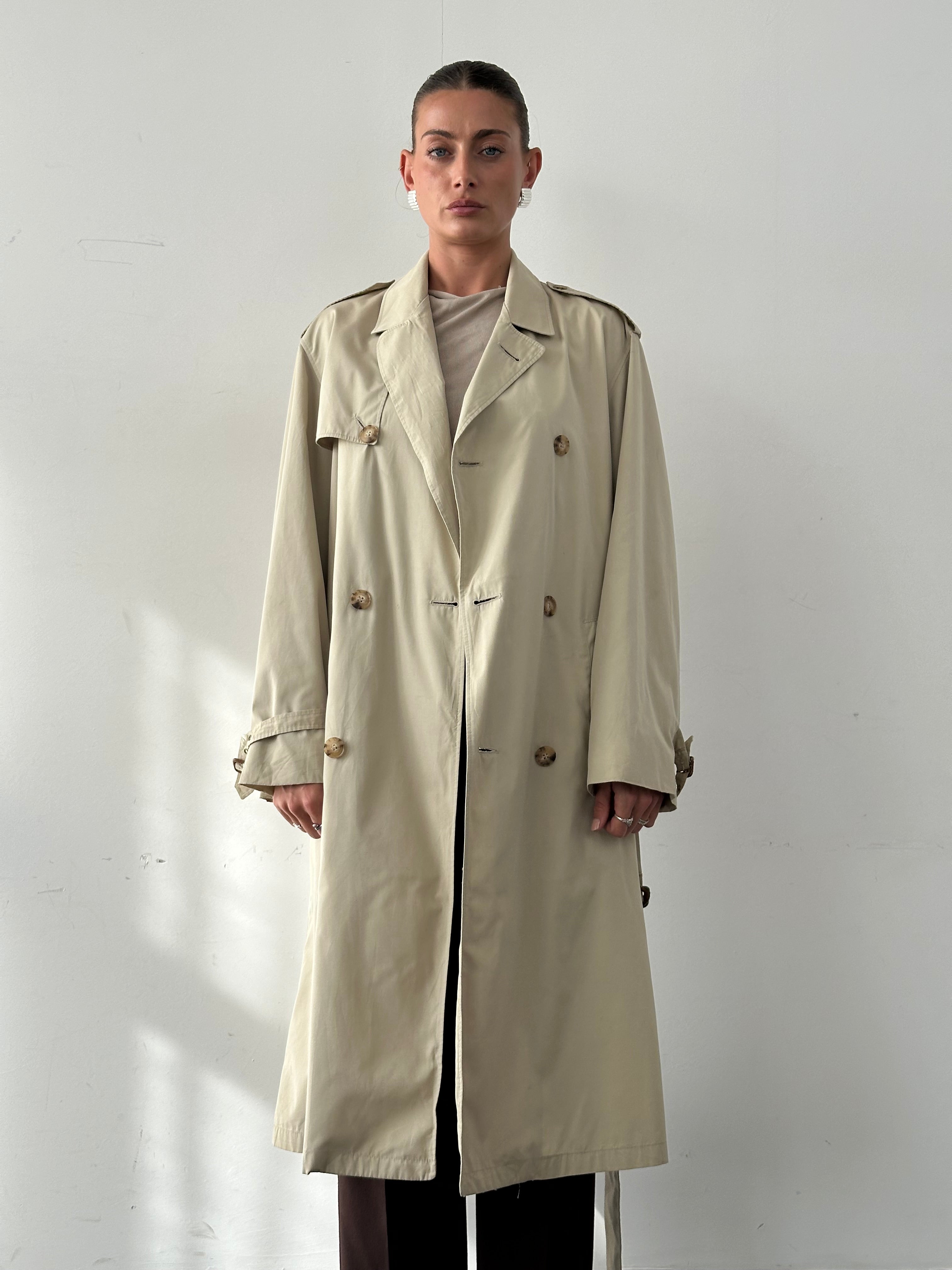 Christian Dior Paris cotton double-breasted belted trench coat in beige, size 40R/XL, featuring classic design and stylish details.