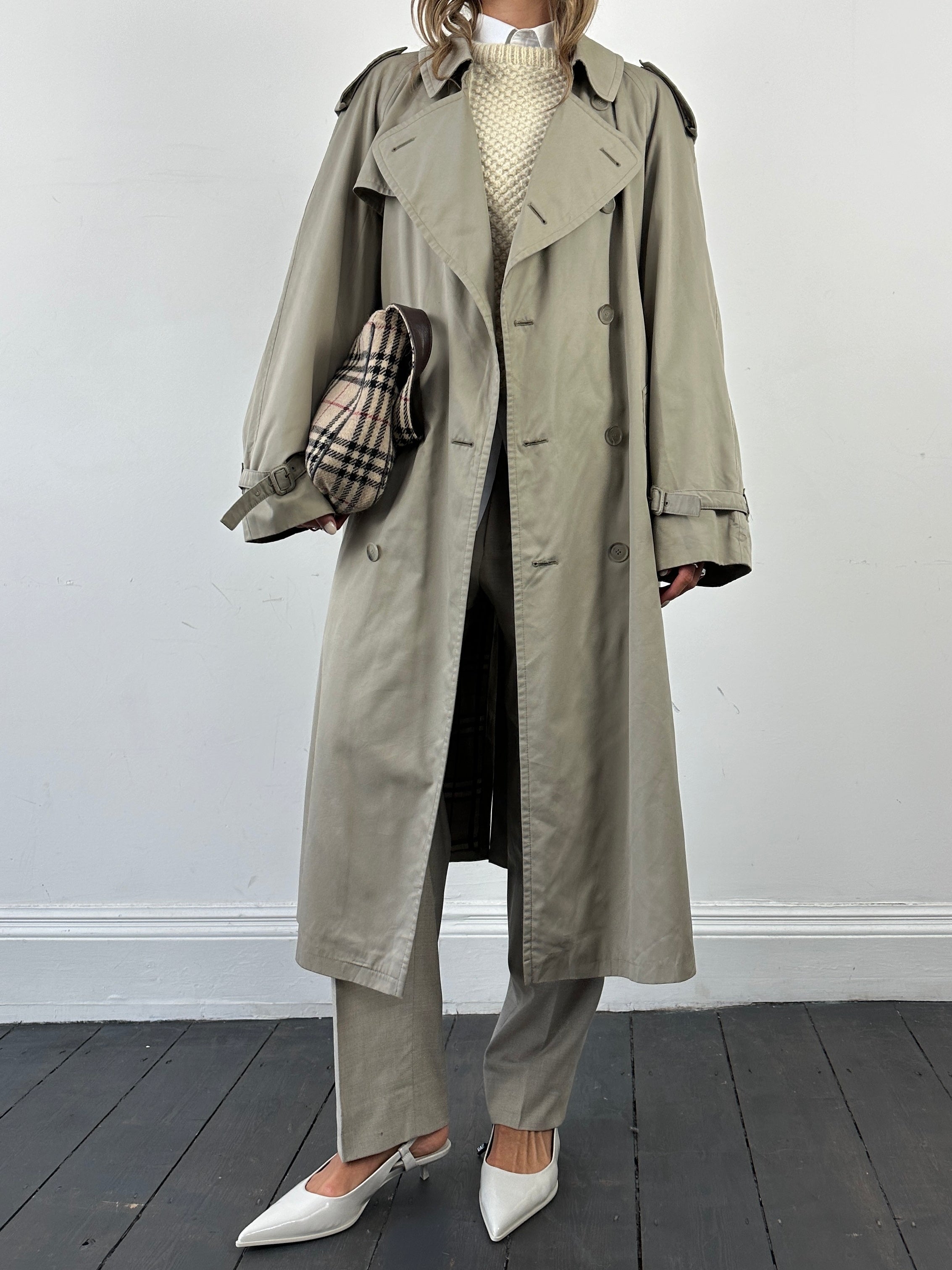 Vintage double-breasted trench coat in XXL size, classic style with belt, lapels, and button details, displayed on a hanger.