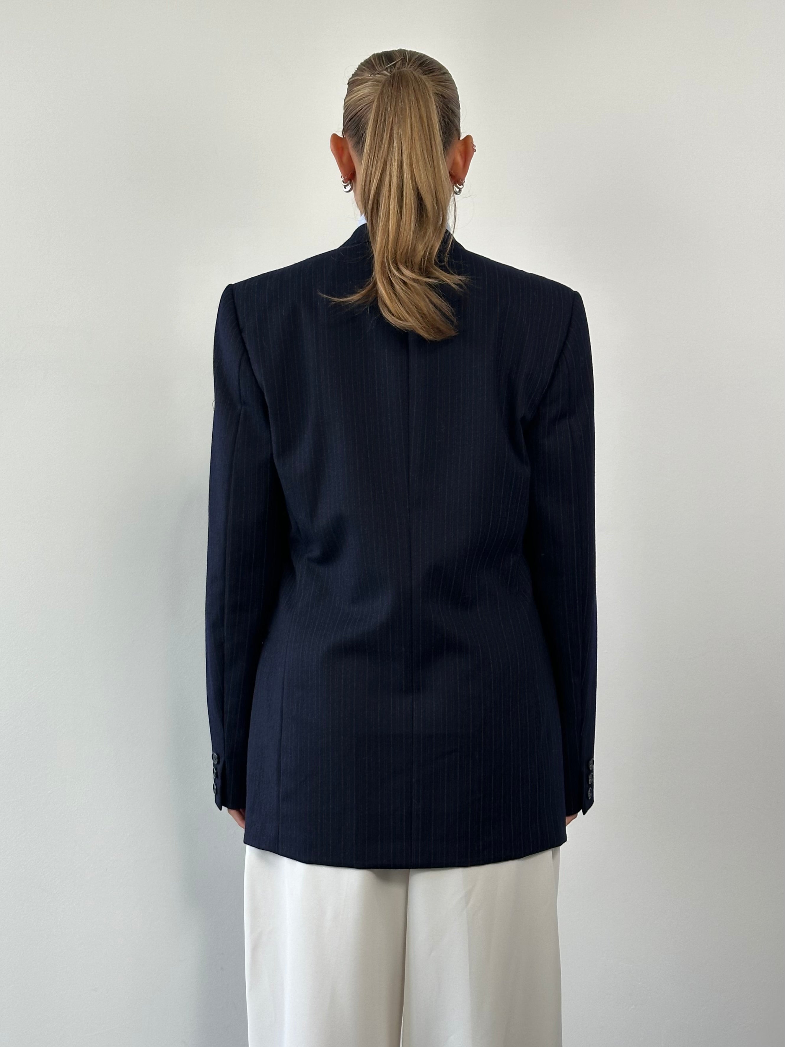 Vintage pure brushed wool stripe double-breasted blazer in size 42R/L, featuring classic tailored design and stylish lapel details.