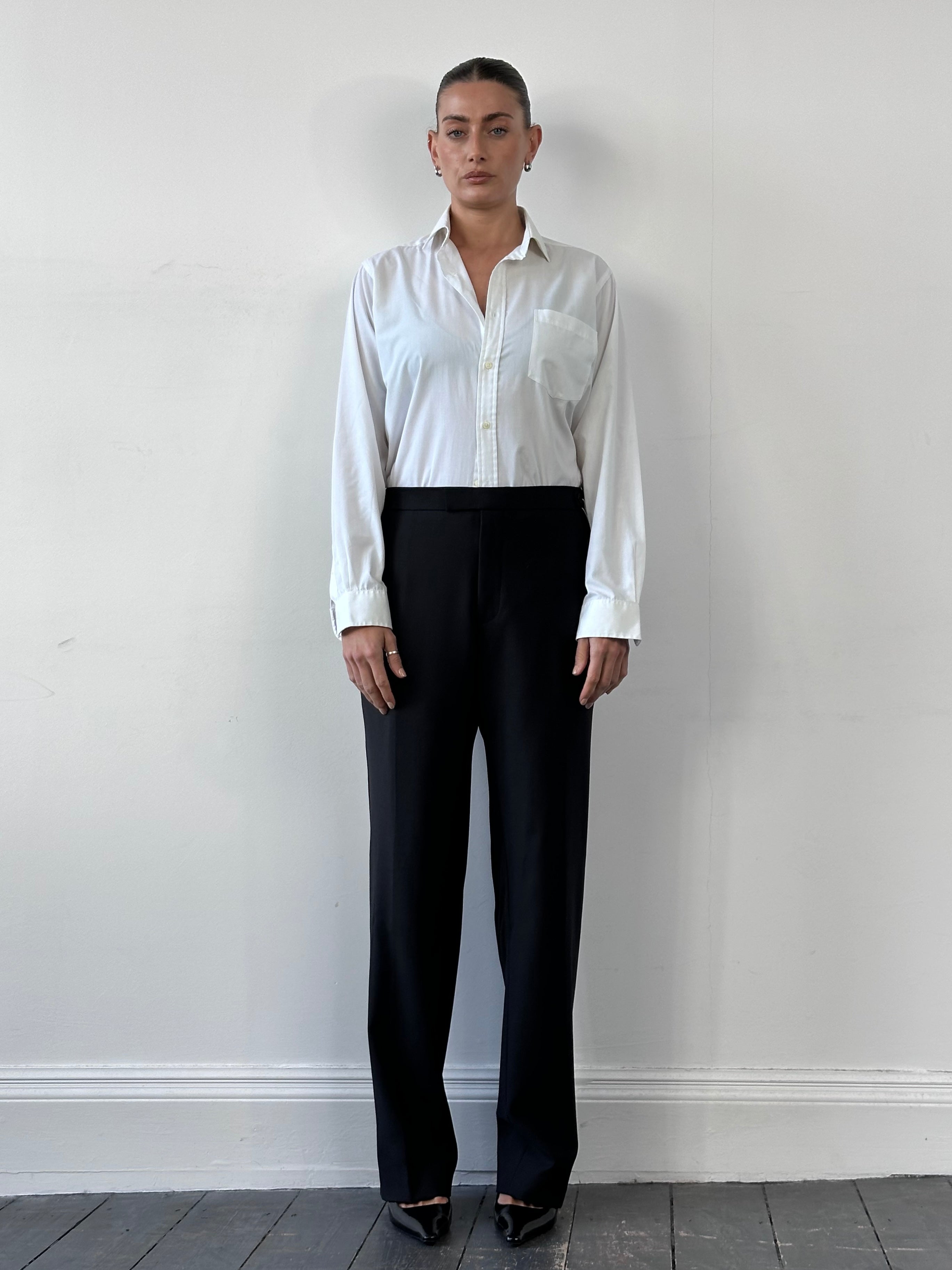 Balmain pure wool tuxedo tailored trousers in black, featuring a slim fit with side pockets and a tailored waistband.