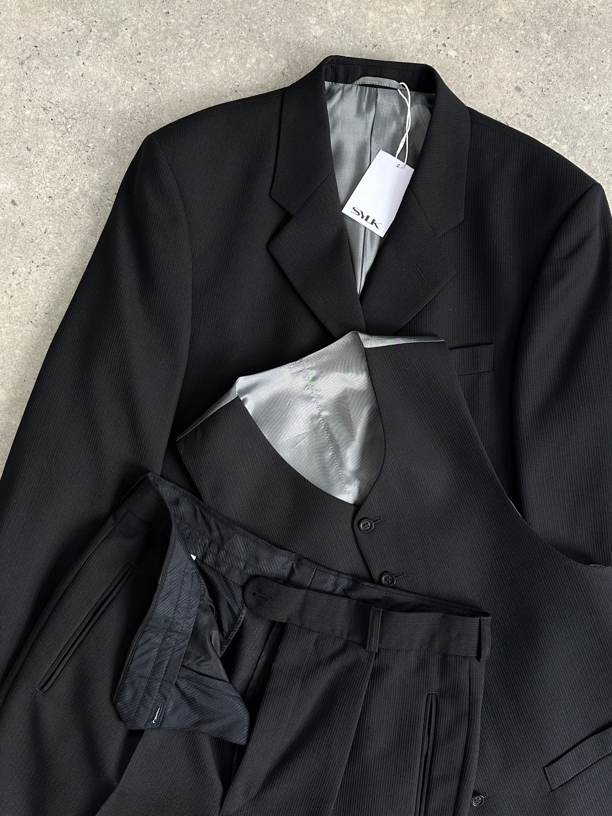 Vintage wool ribbed three-piece suit in size 38R/W30, featuring tailored jacket, vest, and trousers in classic style.