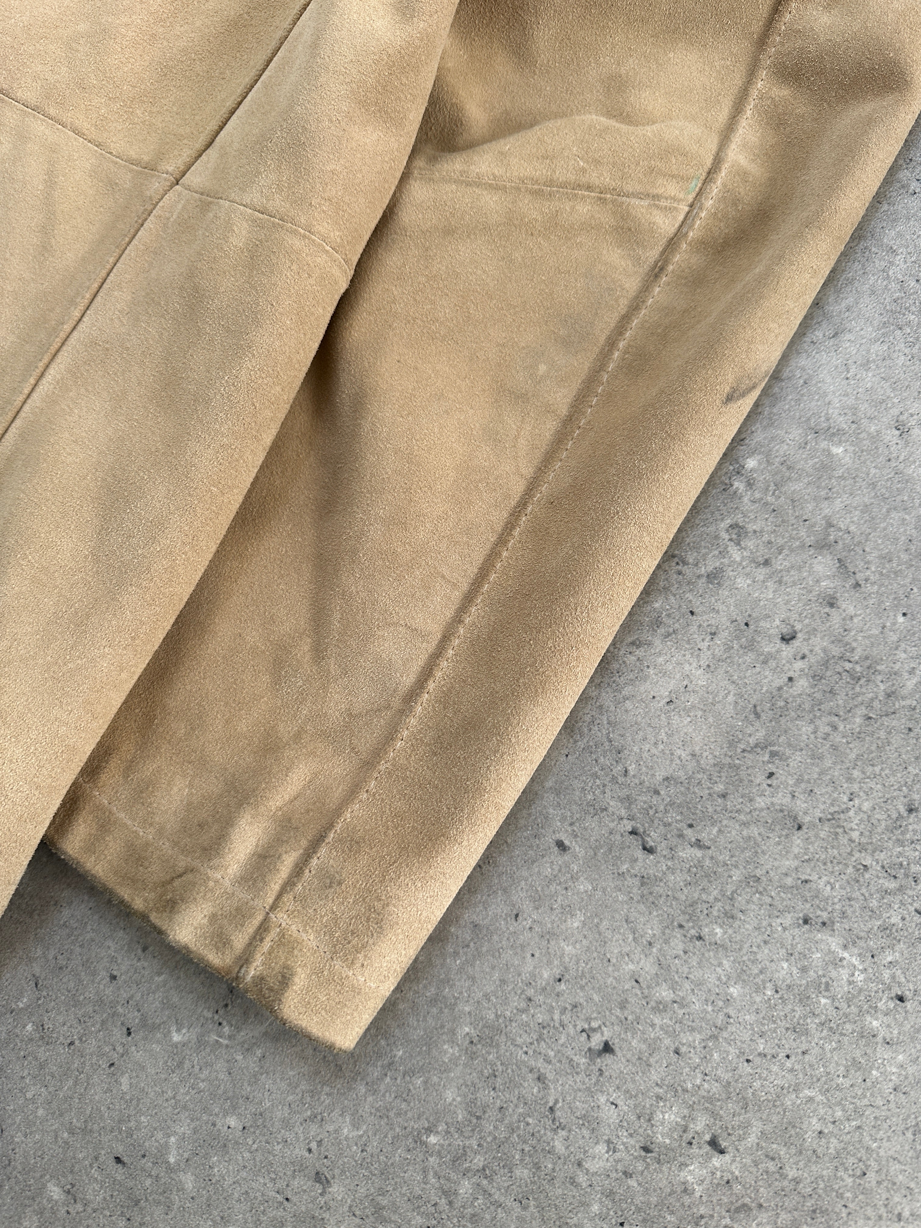 Vintage Italian suede jacket in size large, featuring classic design and soft brown leather craftsmanship.