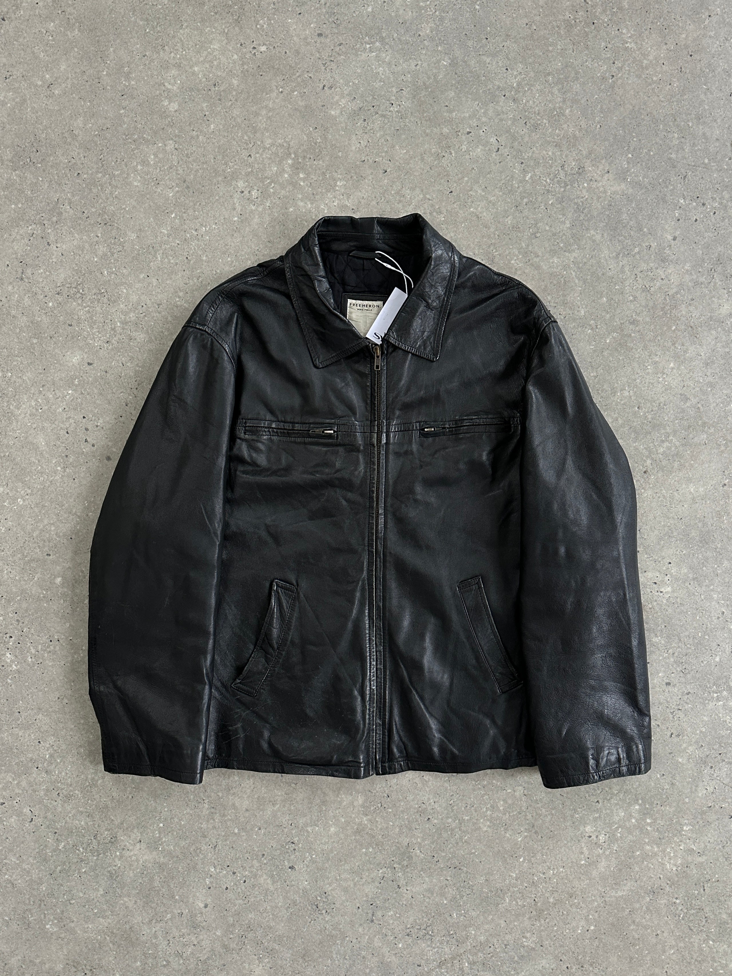Conbipel zip-up leather jacket in size L, black with smooth leather texture, featuring a front zipper and classic collar.