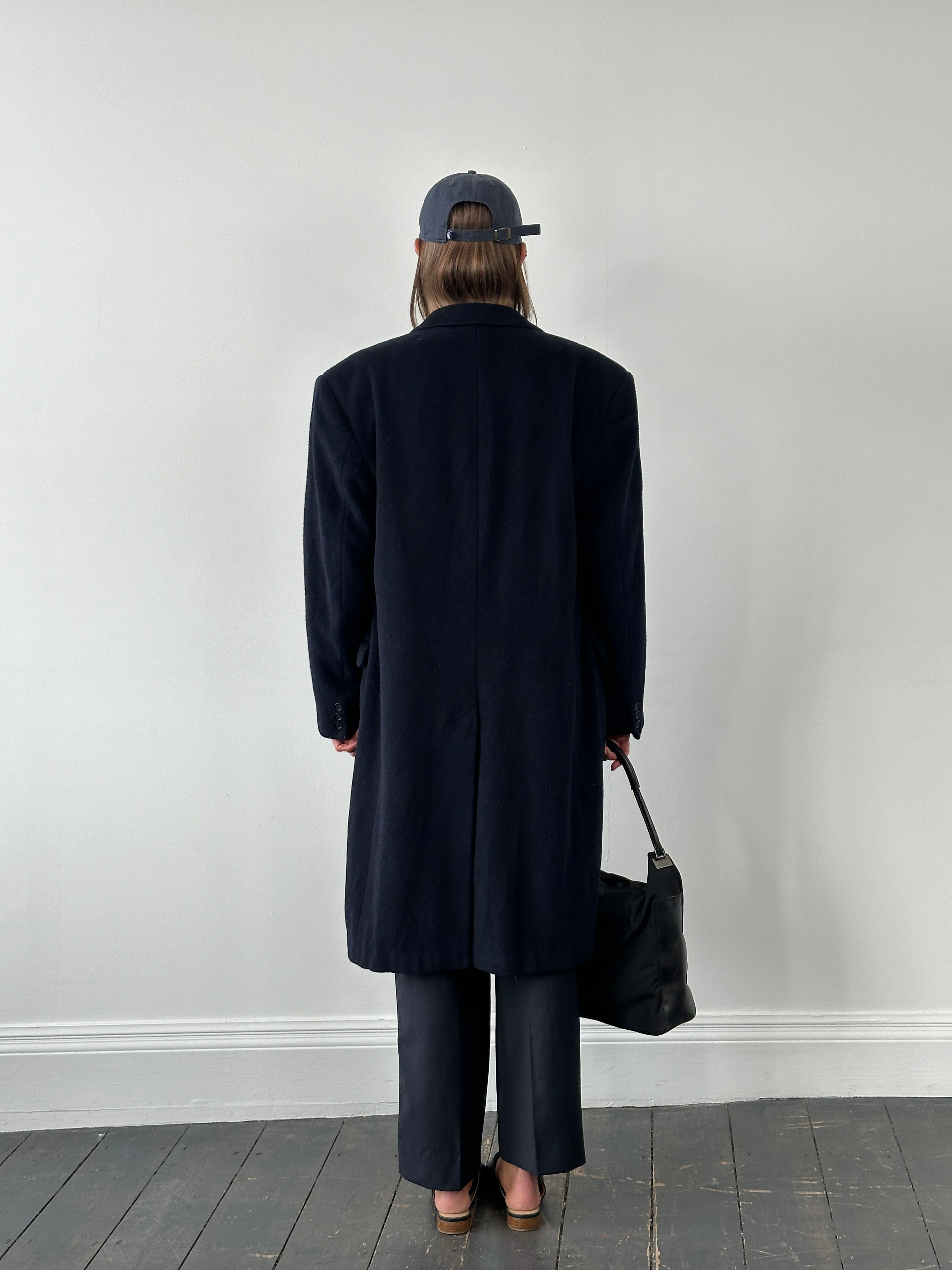 Vintage Italian 1990s wool double-breasted high neck coat in XL/XXL, showcasing classic style and warm, textured fabric.