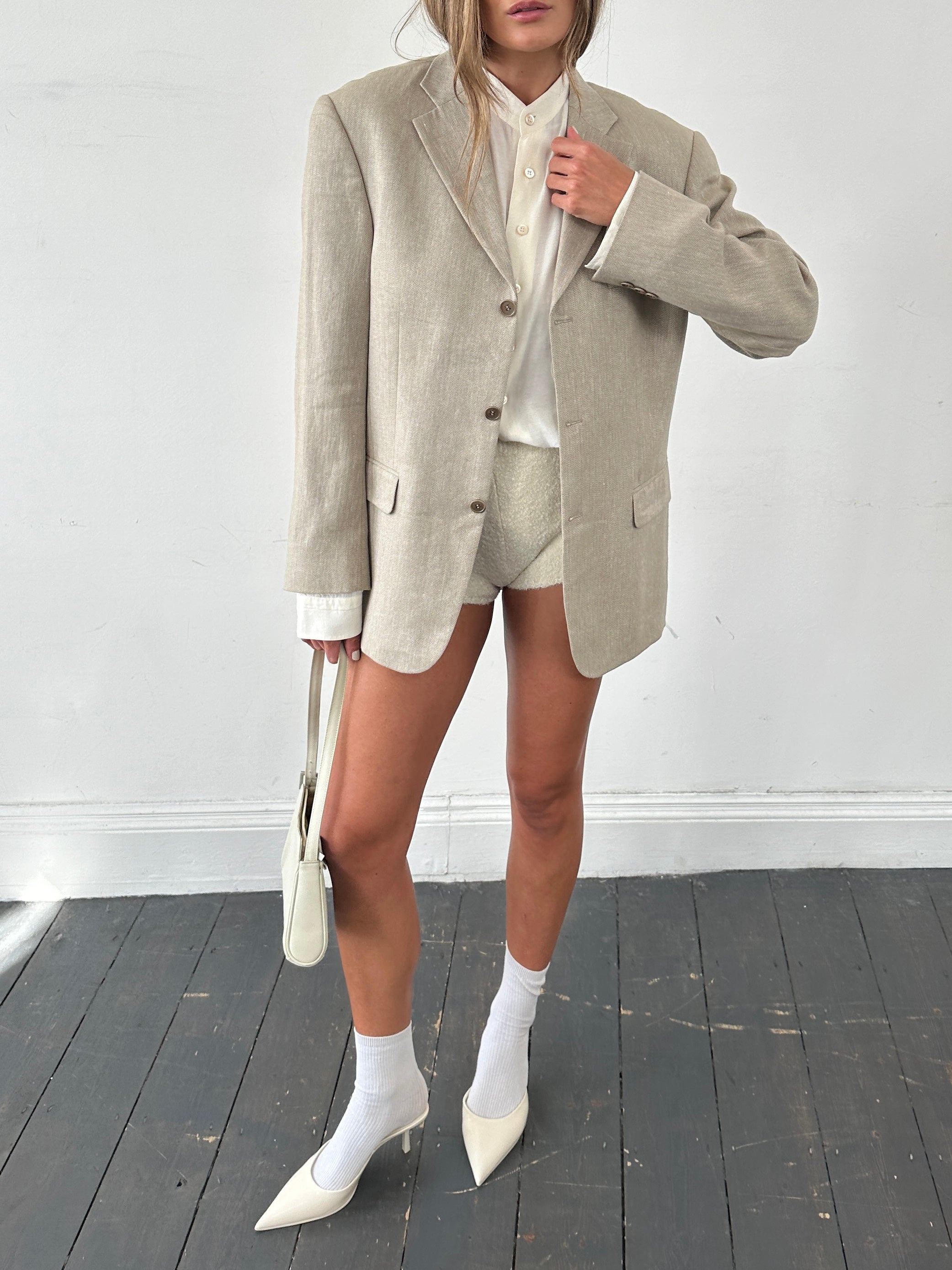 Balmain linen cotton single-breasted blazer in size 38S/M, tailored fit with classic lapel and button closure, light fabric texture.