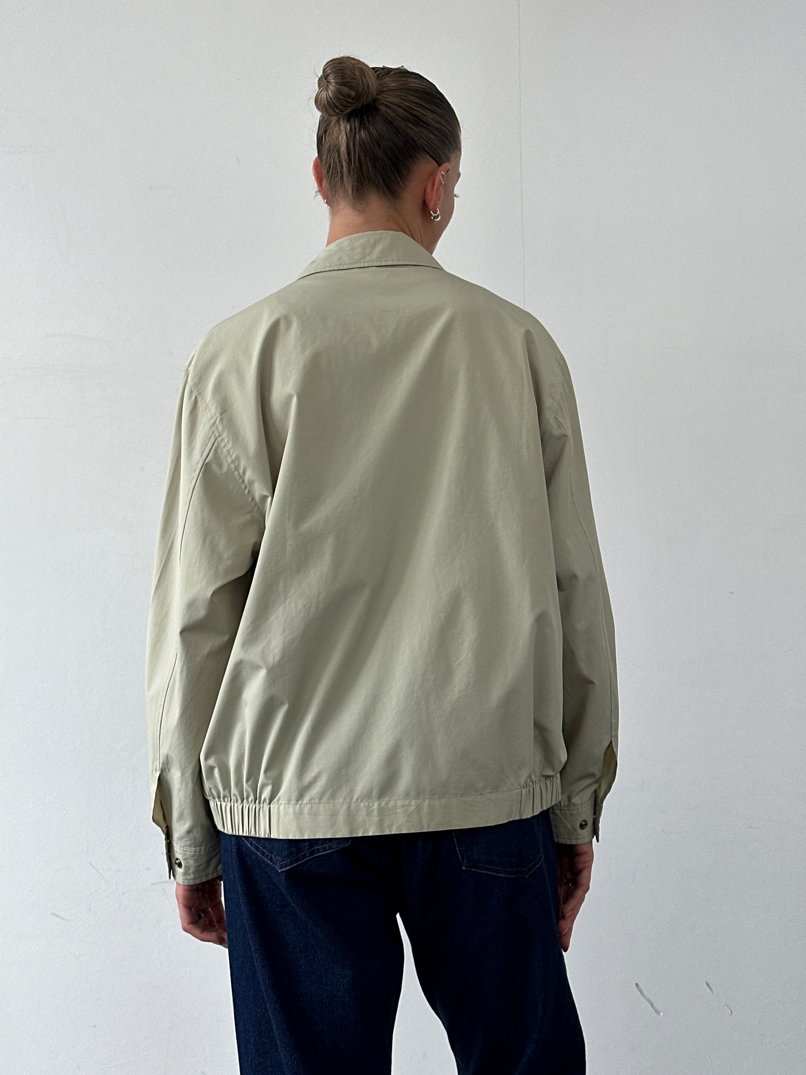 Yves Saint Laurent Pour Homme logo bomber jacket in size L, black with signature branding and classic bomber jacket style.