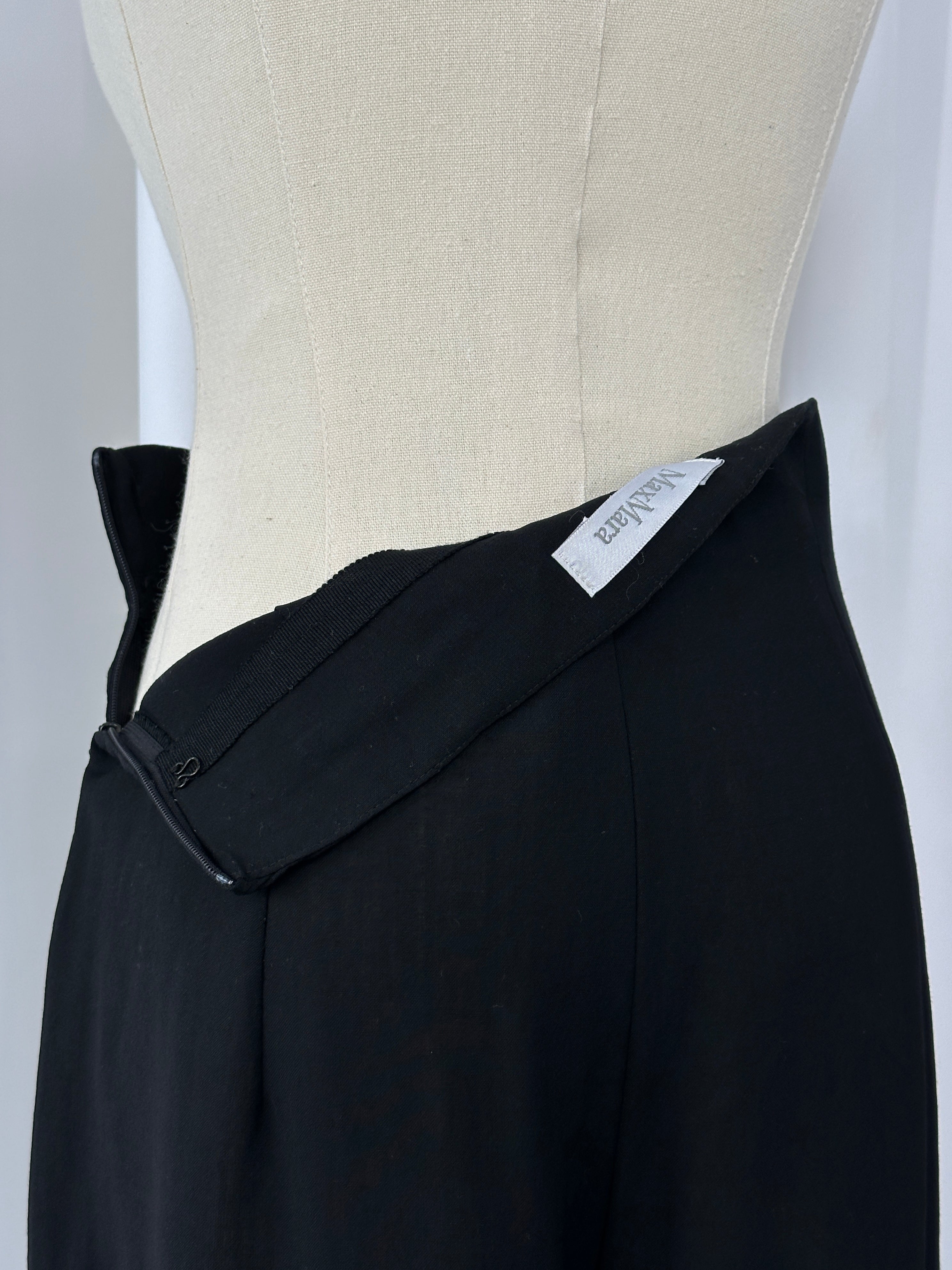 Max Mara 1990s wool high-waisted straight leg tailored trousers in dark fabric, shown on a model with classic styling.