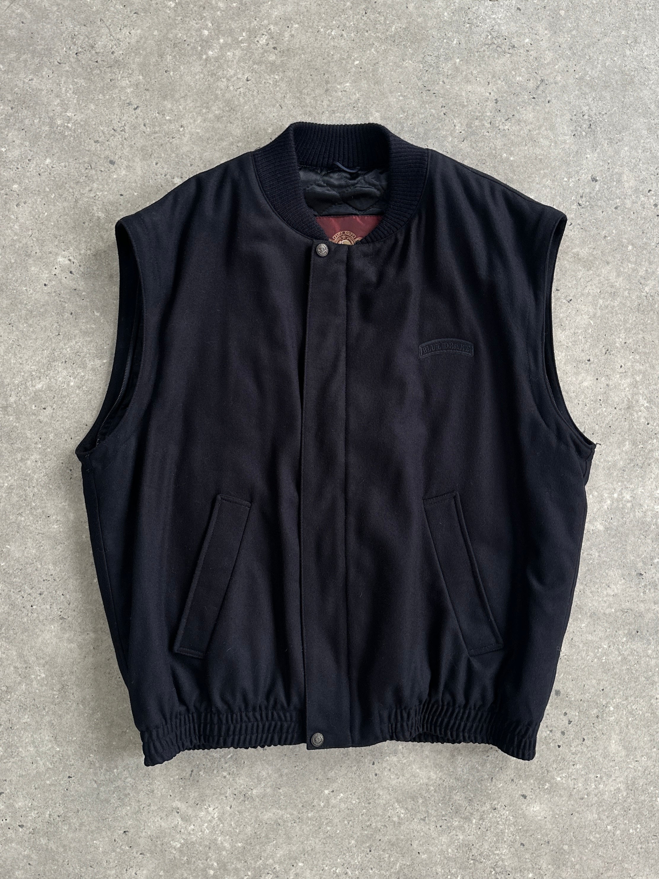 Vintage Italian wool bomber jacket in size L, featuring a classic design with ribbed cuffs and collar, displayed on a neutral background.