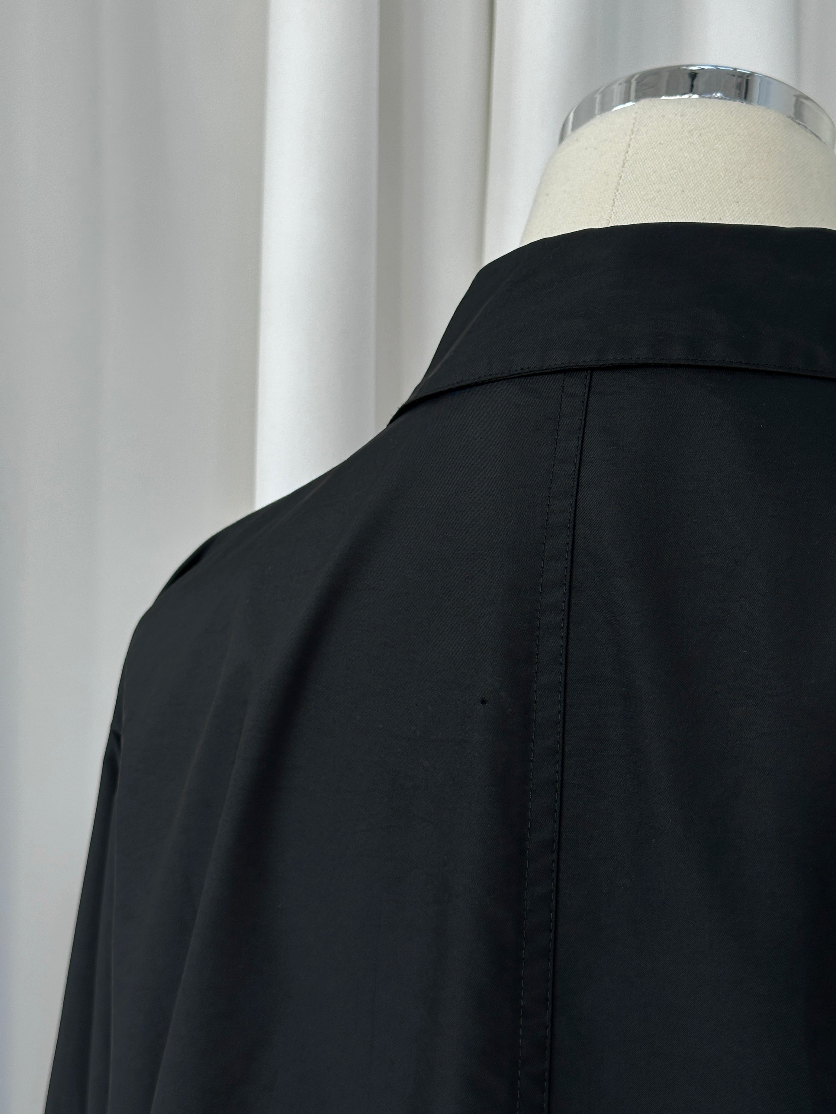 Max Mara Weekend 2000s black bomber jacket with concealed placket and ribbed cuffs, size M, displayed on a hanger.