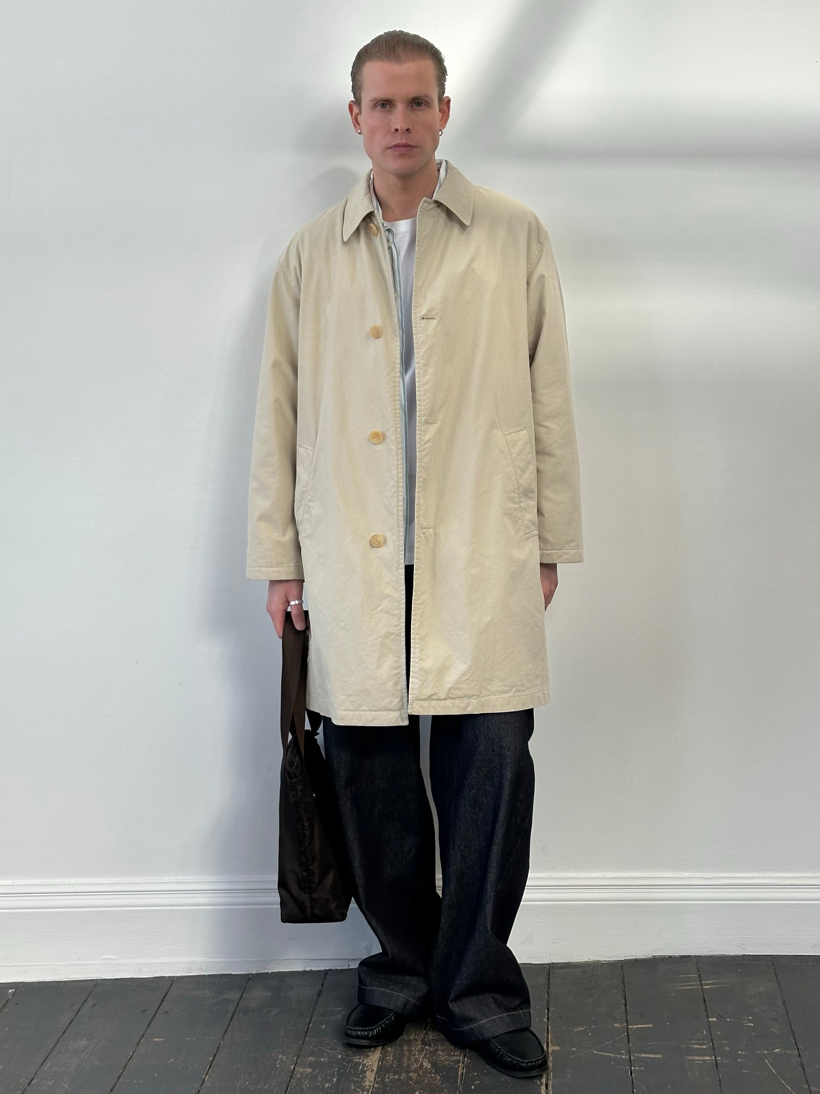 Hugo Boss 2000s cotton trench coat with concealed placket, knee-length, in size L, displayed on a hanger.