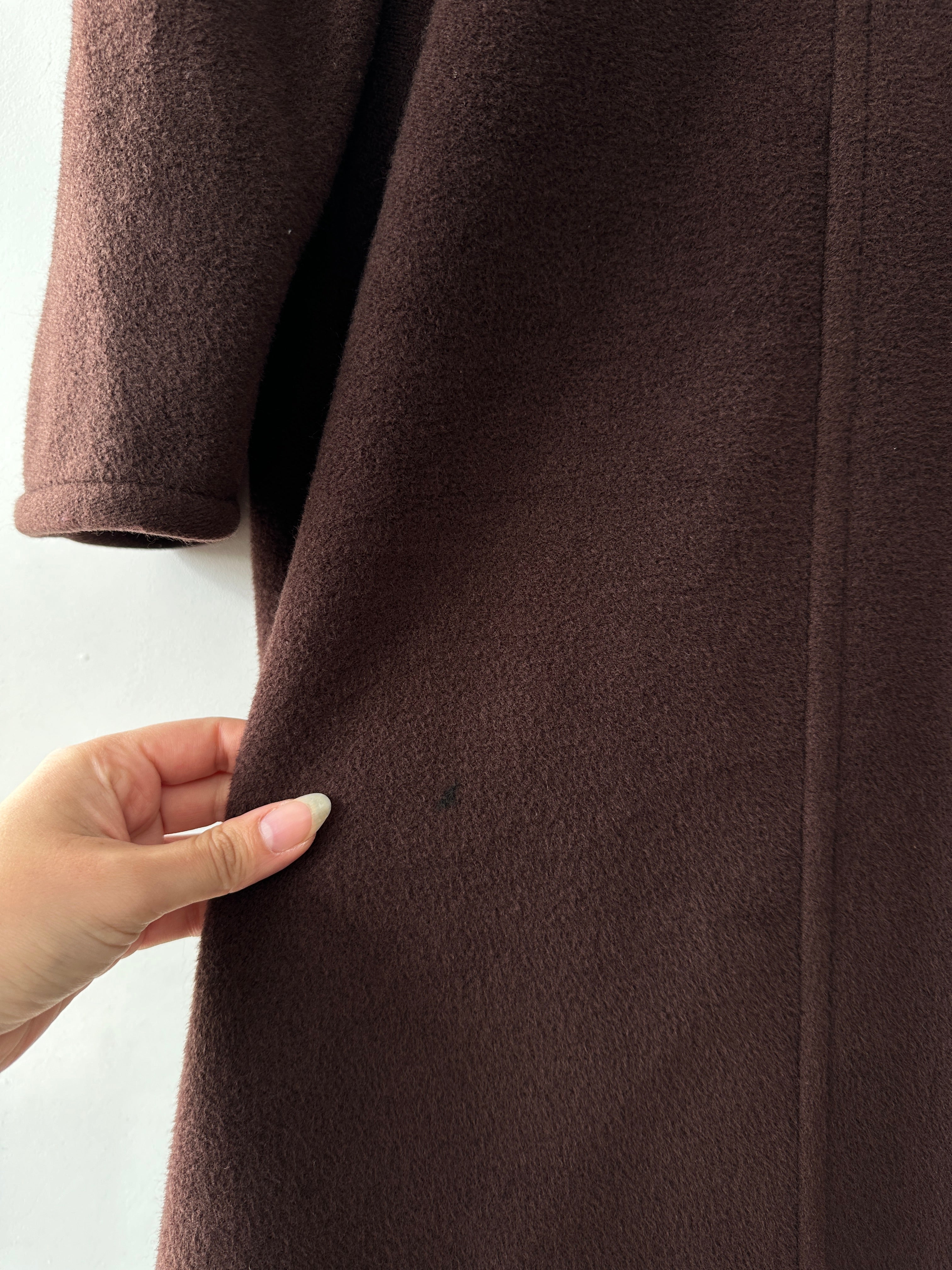 Marella Wool Cashmere Double Breasted Coat in size L displayed on a hanger, showcasing its classic tailored design and rich fabric texture.